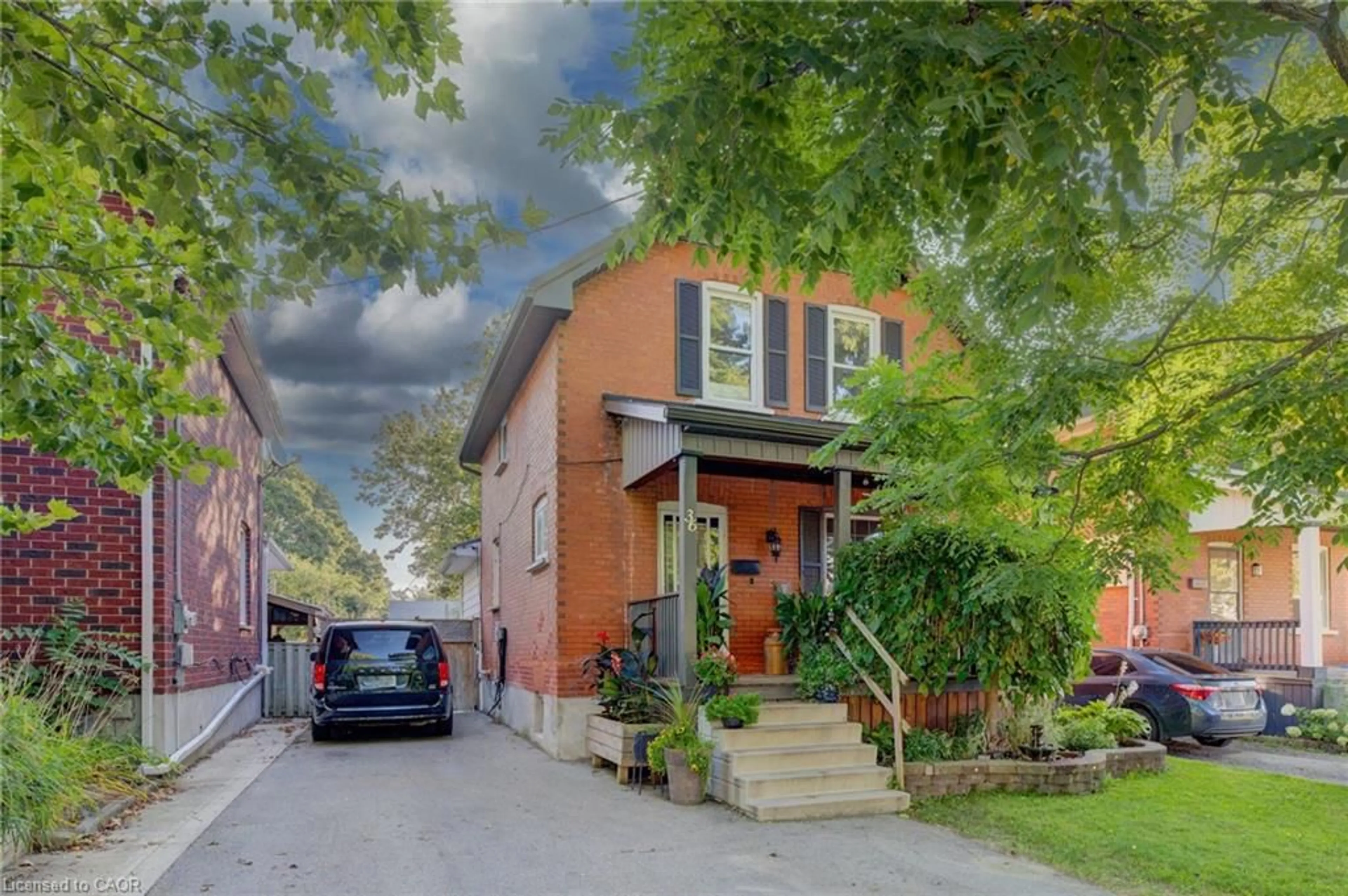 Home with brick exterior material, street for 36 Cherry St, Stratford Ontario N5A 2E8