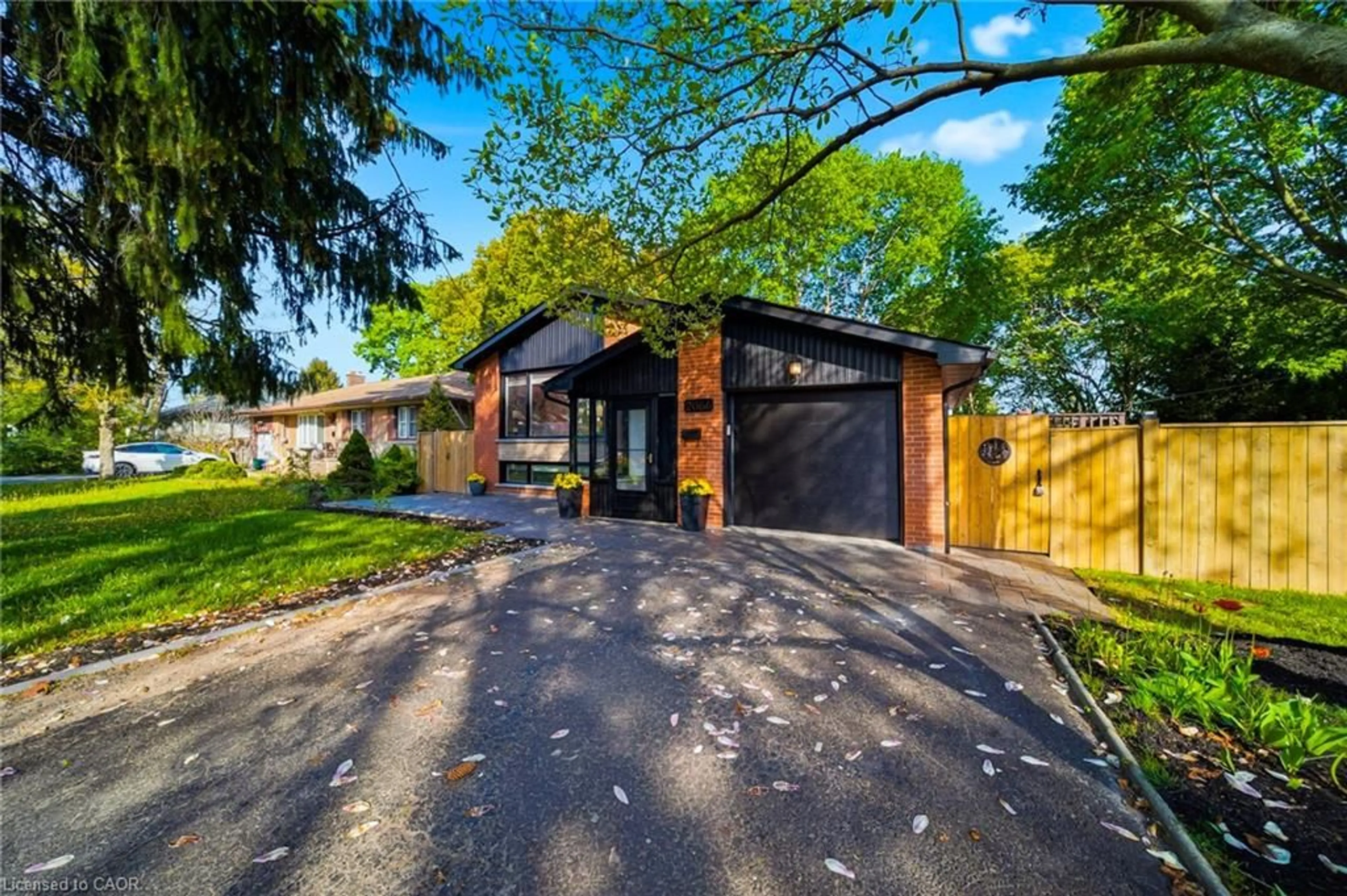 Home with brick exterior material, street for 2066 Rebecca St, Oakville Ontario L6L 2A2