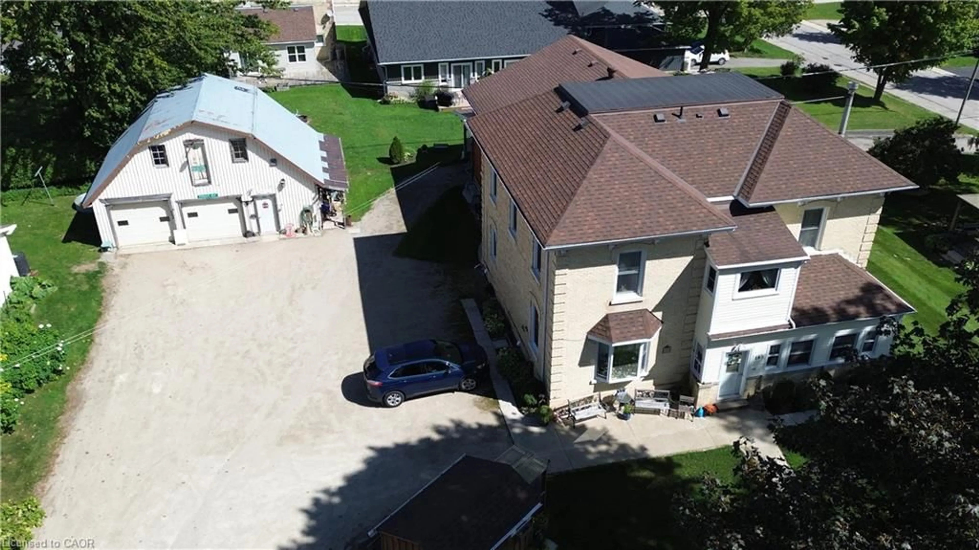 A pic from outside/outdoor area/front of a property/back of a property/a pic from drone, street for 163 John St, Harriston Ontario N0G 1Z0