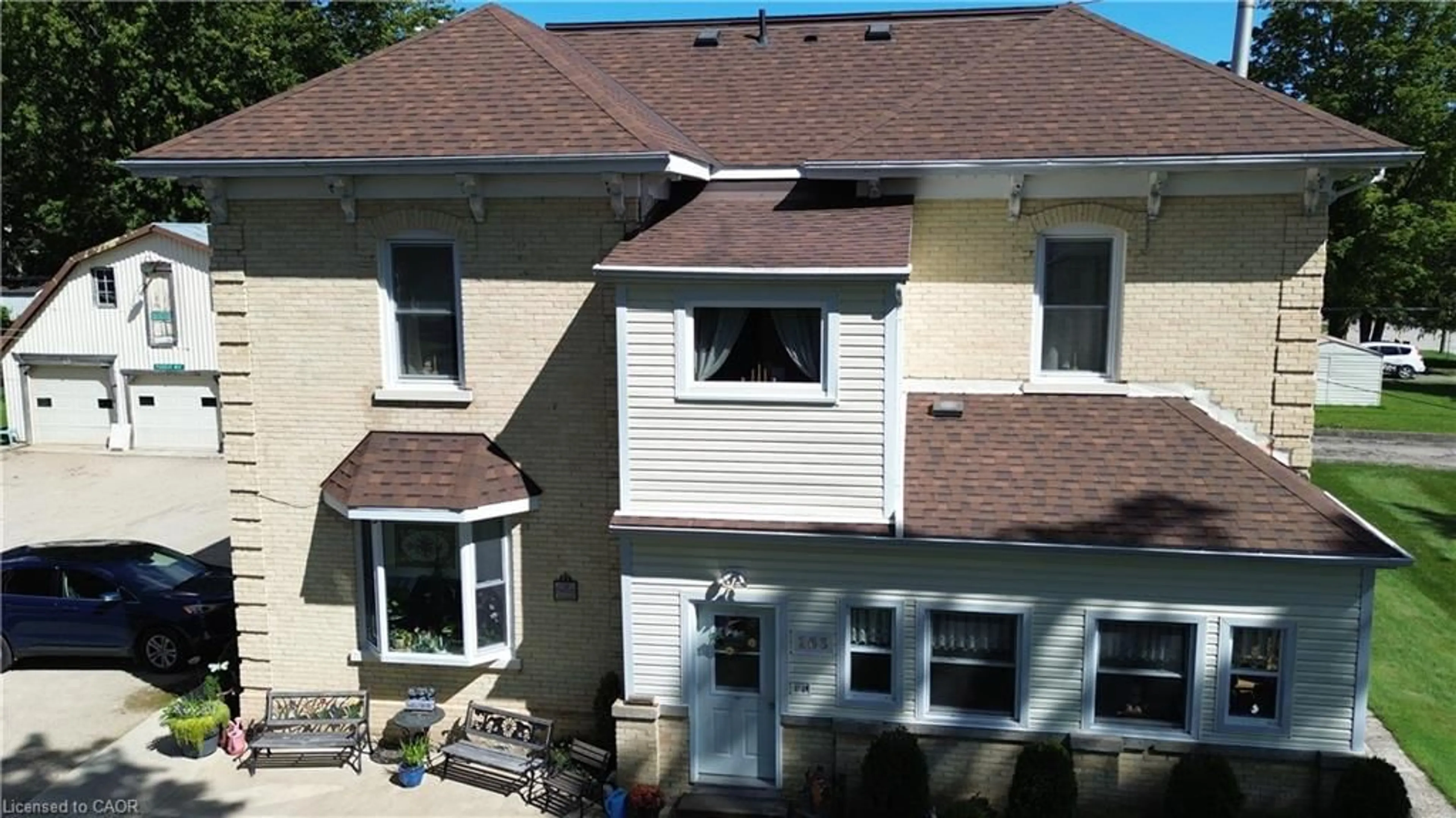 Home with vinyl exterior material, building for 163 John St, Harriston Ontario N0G 1Z0