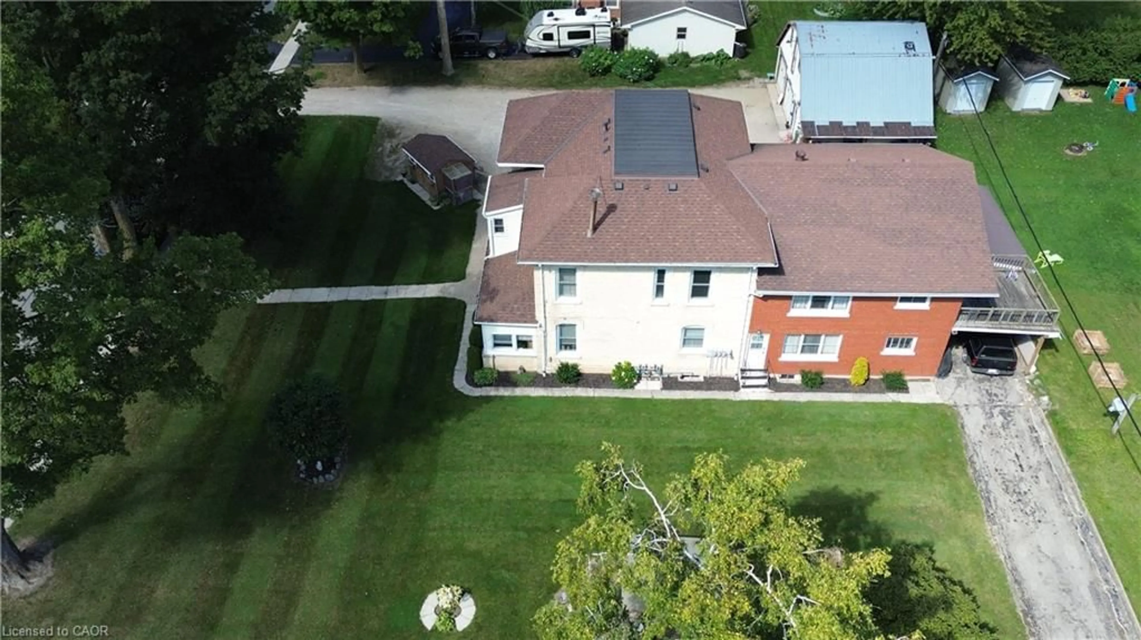 A pic from outside/outdoor area/front of a property/back of a property/a pic from drone, unknown for 163 John St, Harriston Ontario N0G 1Z0