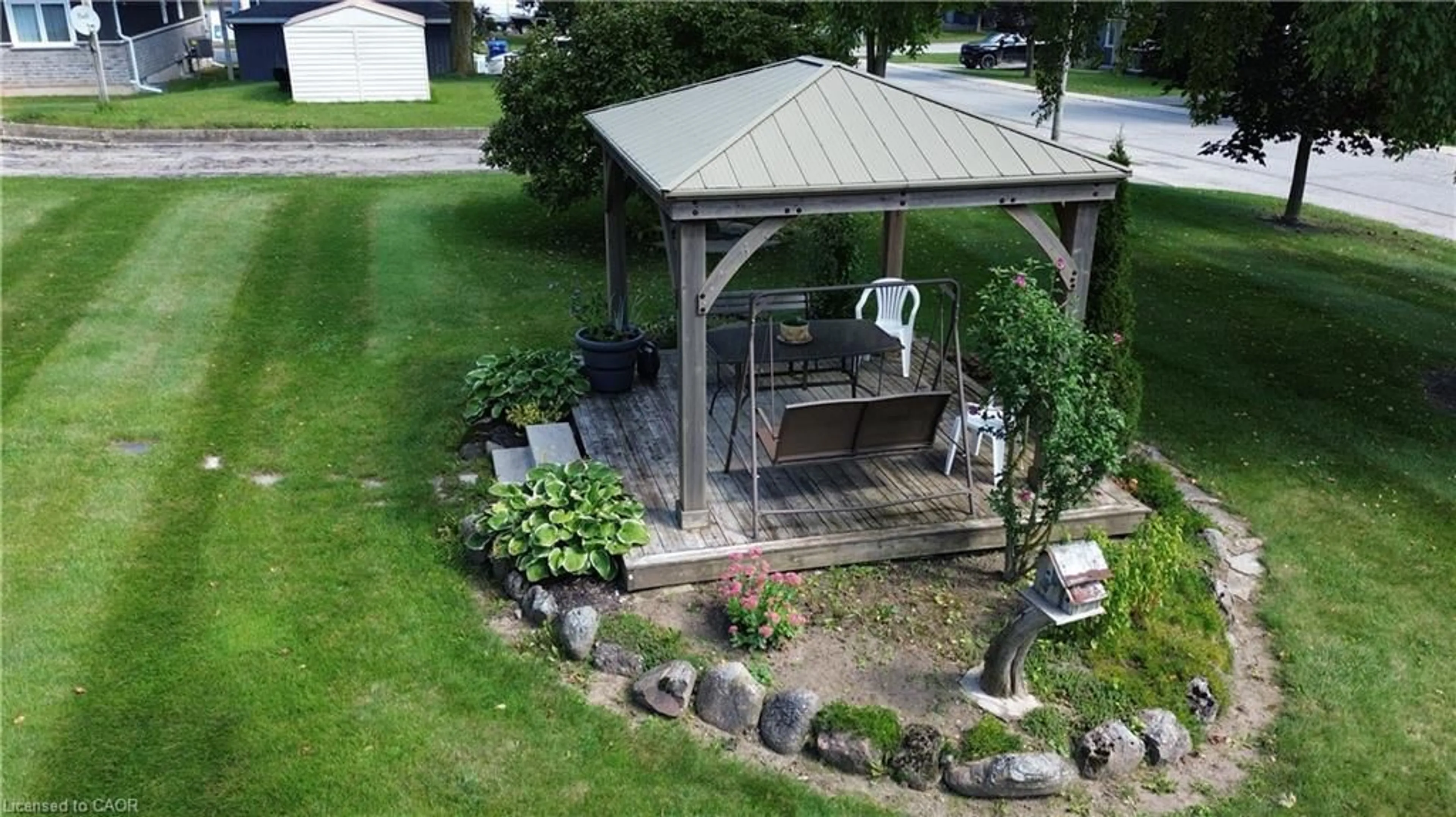 A pic from outside/outdoor area/front of a property/back of a property/a pic from drone, water/lake/river/ocean view for 163 John St, Harriston Ontario N0G 1Z0