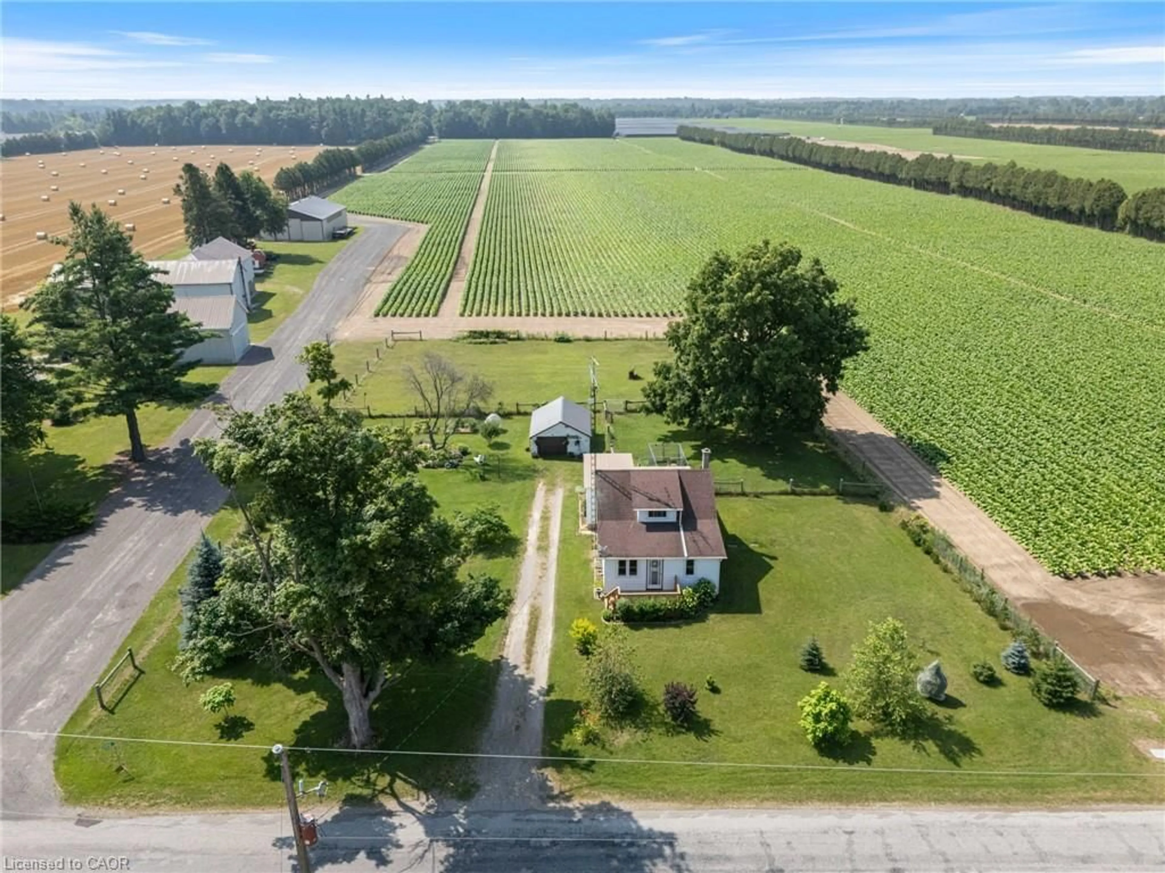 A pic from outside/outdoor area/front of a property/back of a property/a pic from drone, street for 392 Windham Road 7, La Salette Ontario N0E 1H0