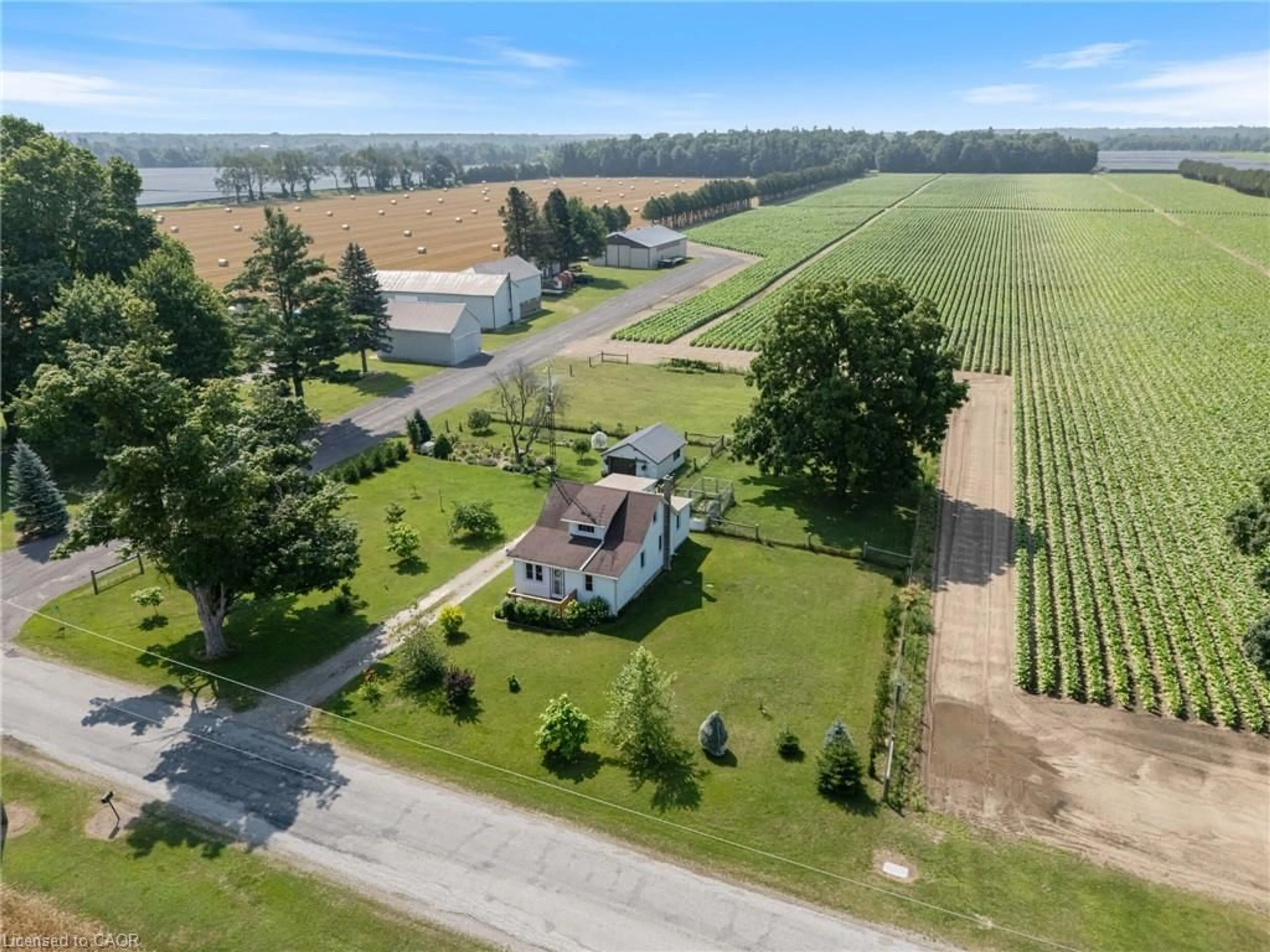 A pic from outside/outdoor area/front of a property/back of a property/a pic from drone, unknown for 392 Windham Road 7, La Salette Ontario N0E 1H0
