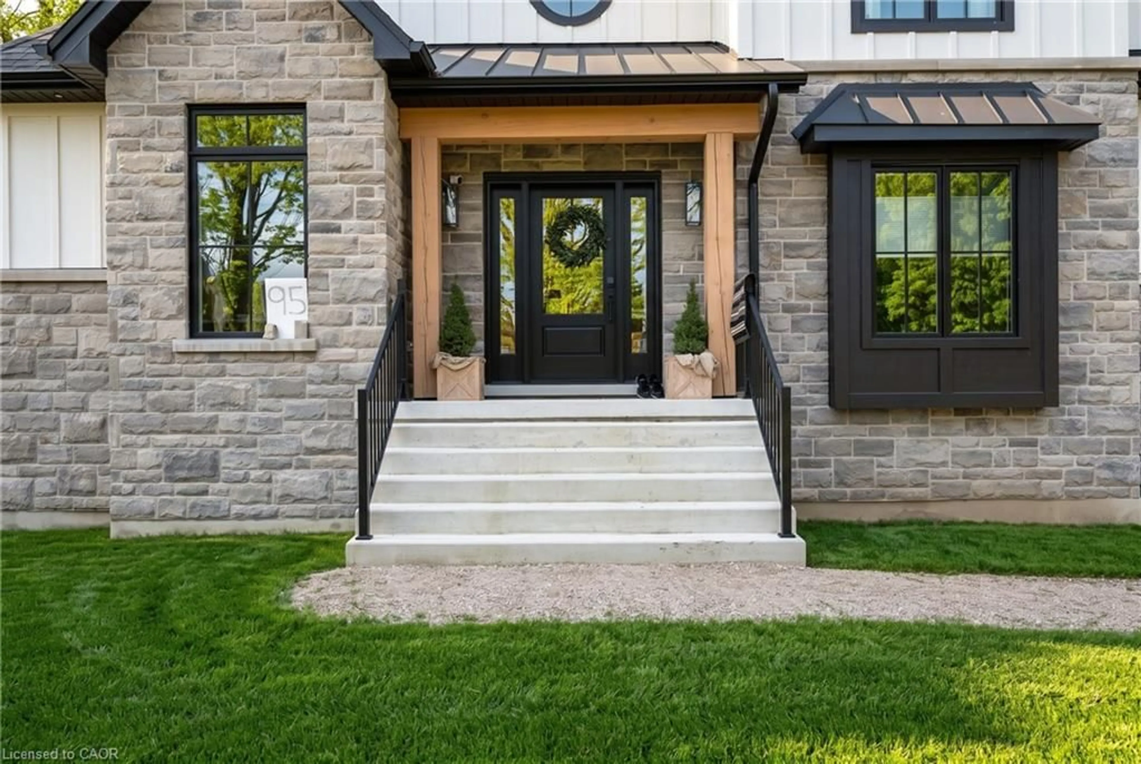 Home with brick exterior material, street for 95 Dawn Ave, Guelph Ontario N1G 4X2