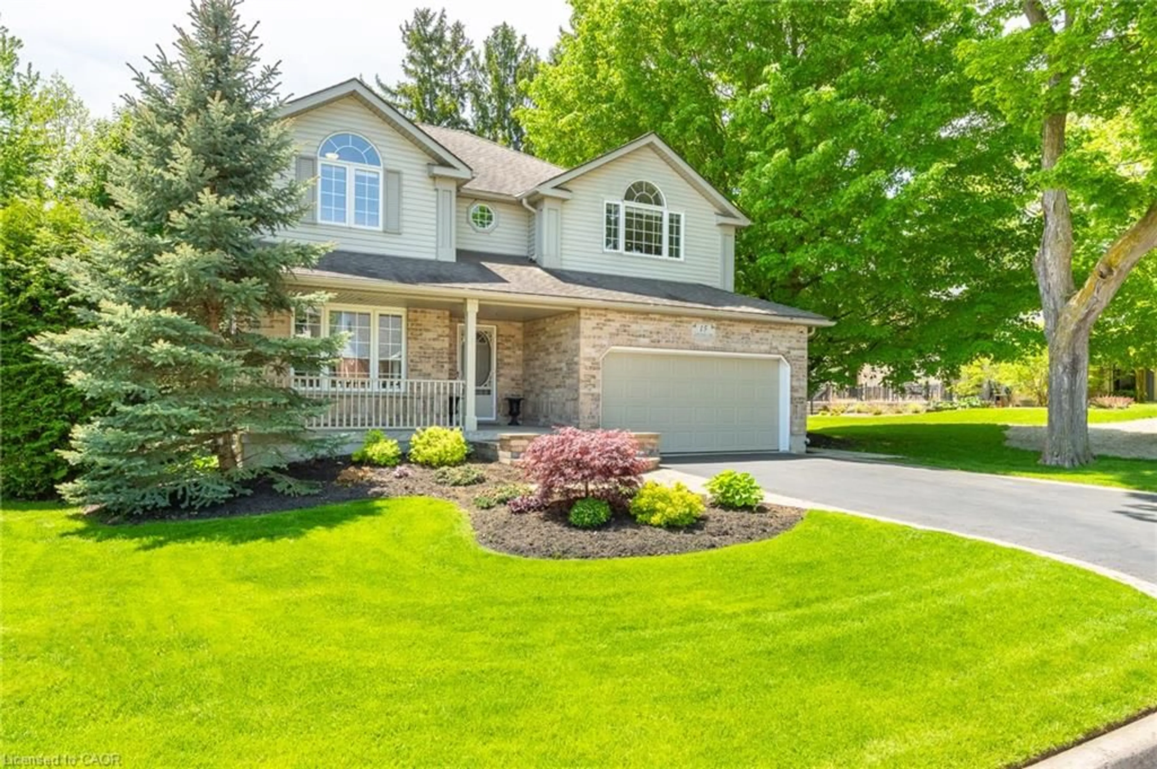 Home with vinyl exterior material, street for 15 Carolinian Lane, Cambridge Ontario N1S 5B5