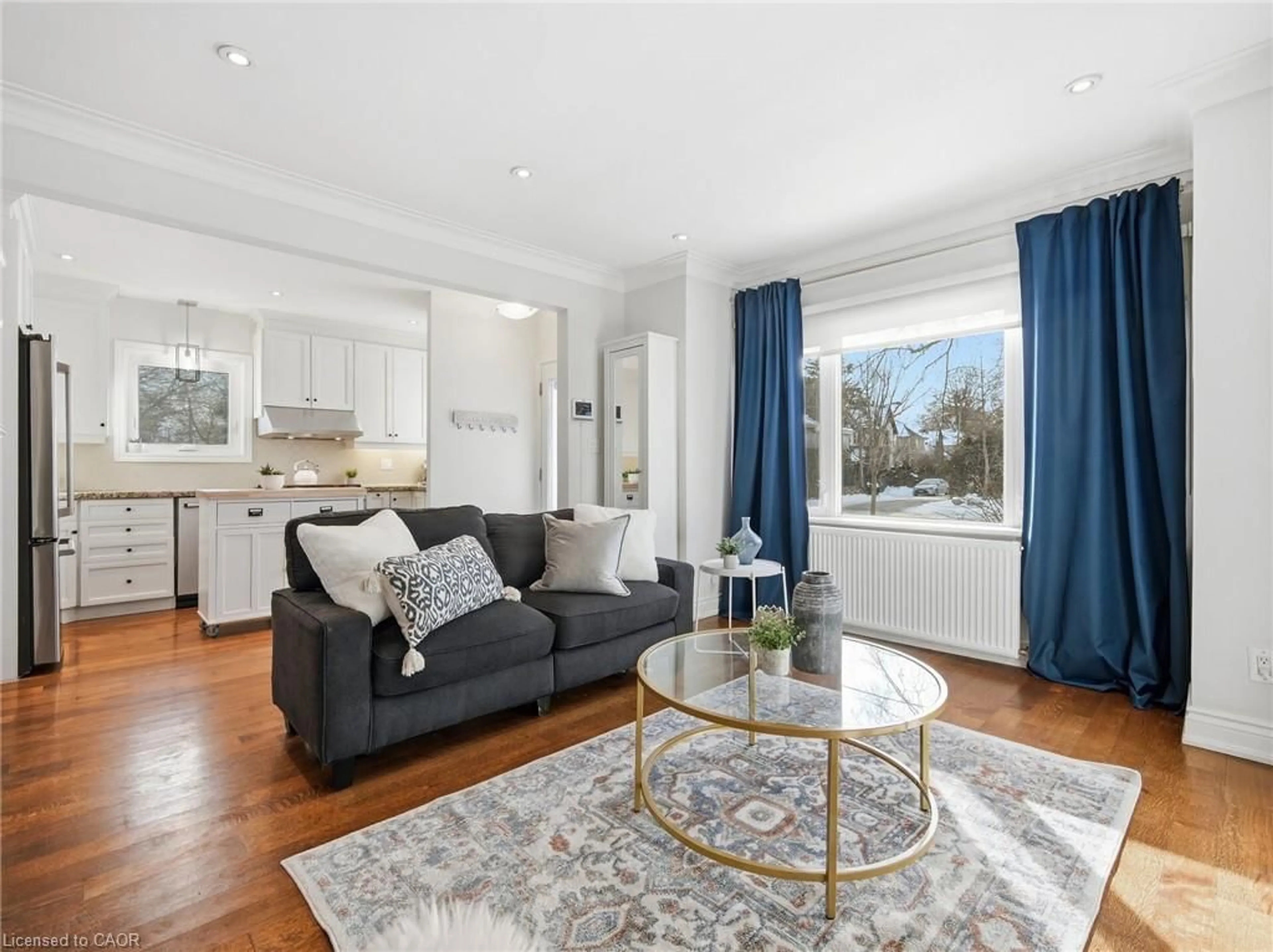 Living room with furniture, wood/laminate floor for 205 Prince Edward Dr, Toronto Ontario M8Y 3X1