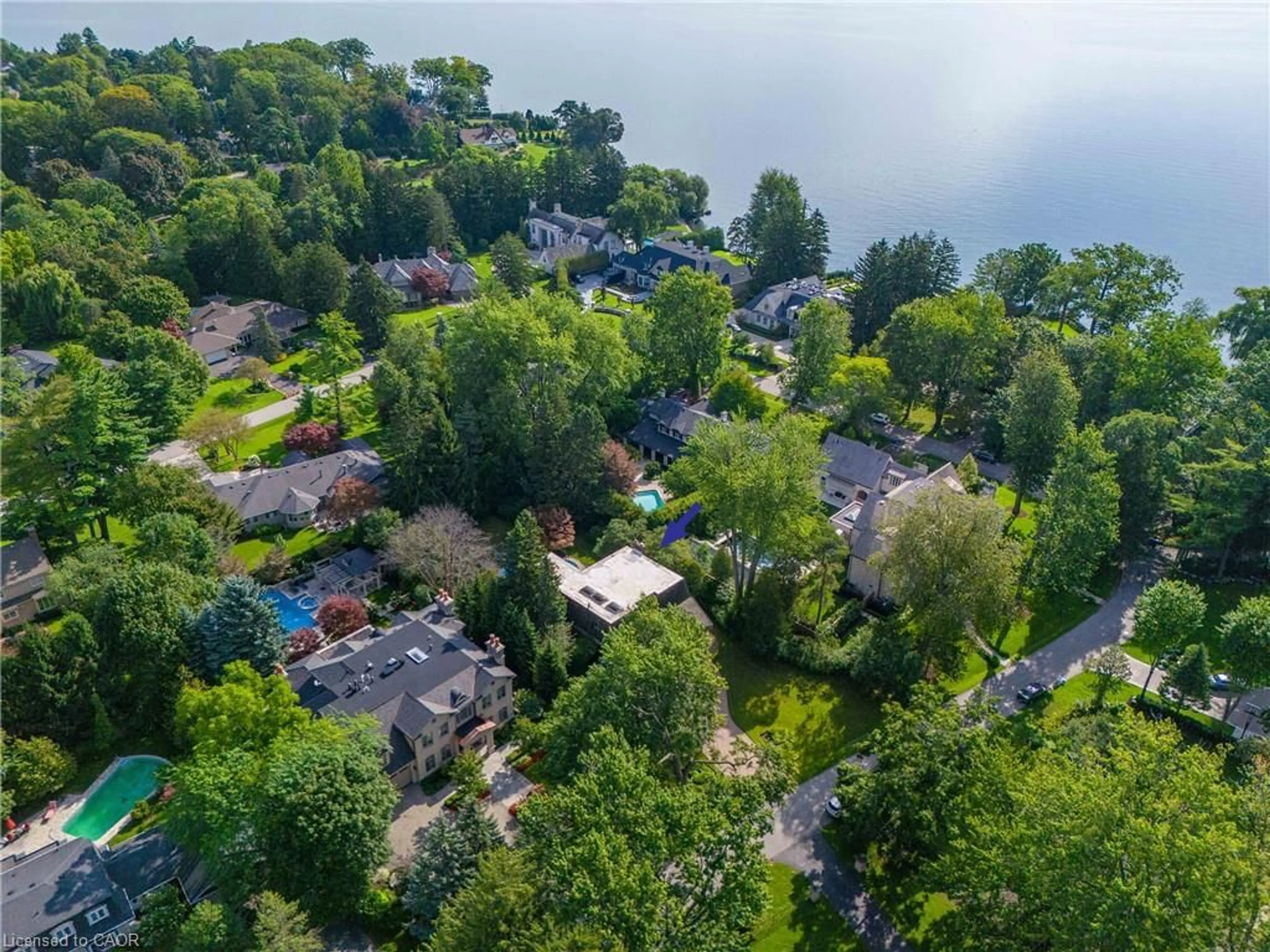 A pic from outside/outdoor area/front of a property/back of a property/a pic from drone, water/lake/river/ocean view for 16 Colonial Cres, Oakville Ontario L6J 4K9