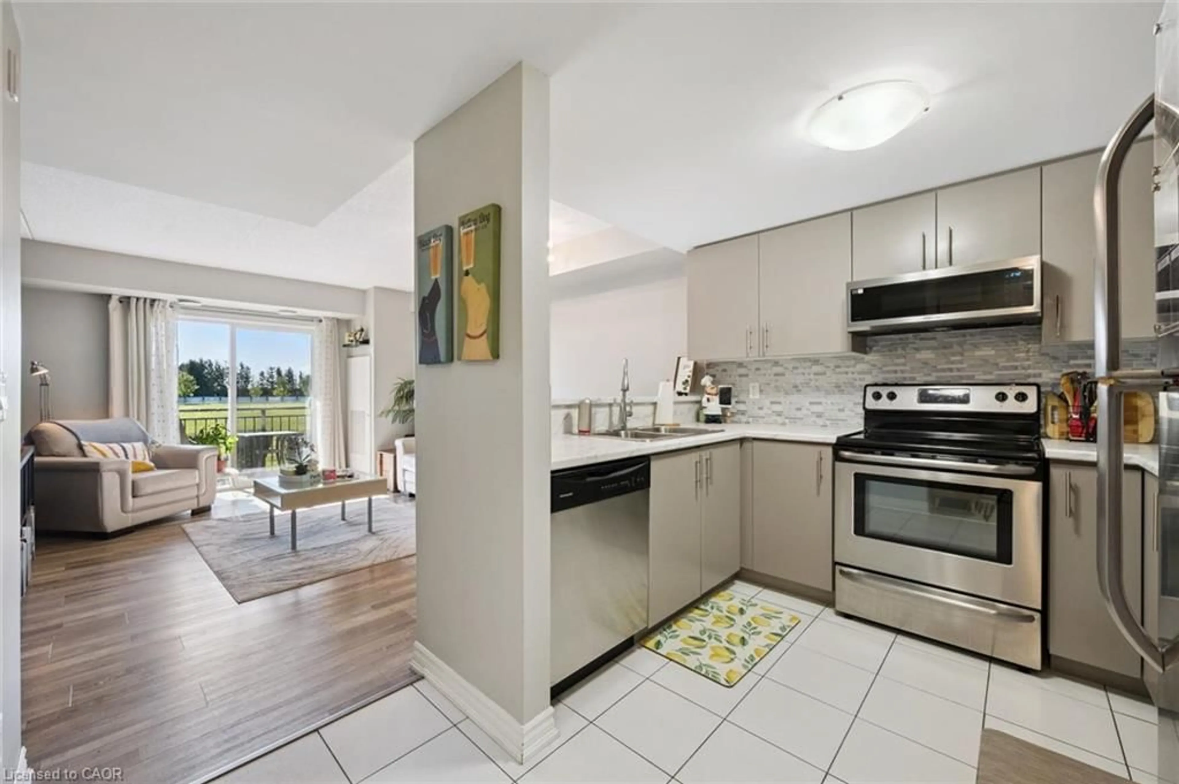 Open concept kitchen, ceramic/tile floor for 103 Westminster Cres #105, Fergus Ontario N1M 0C6