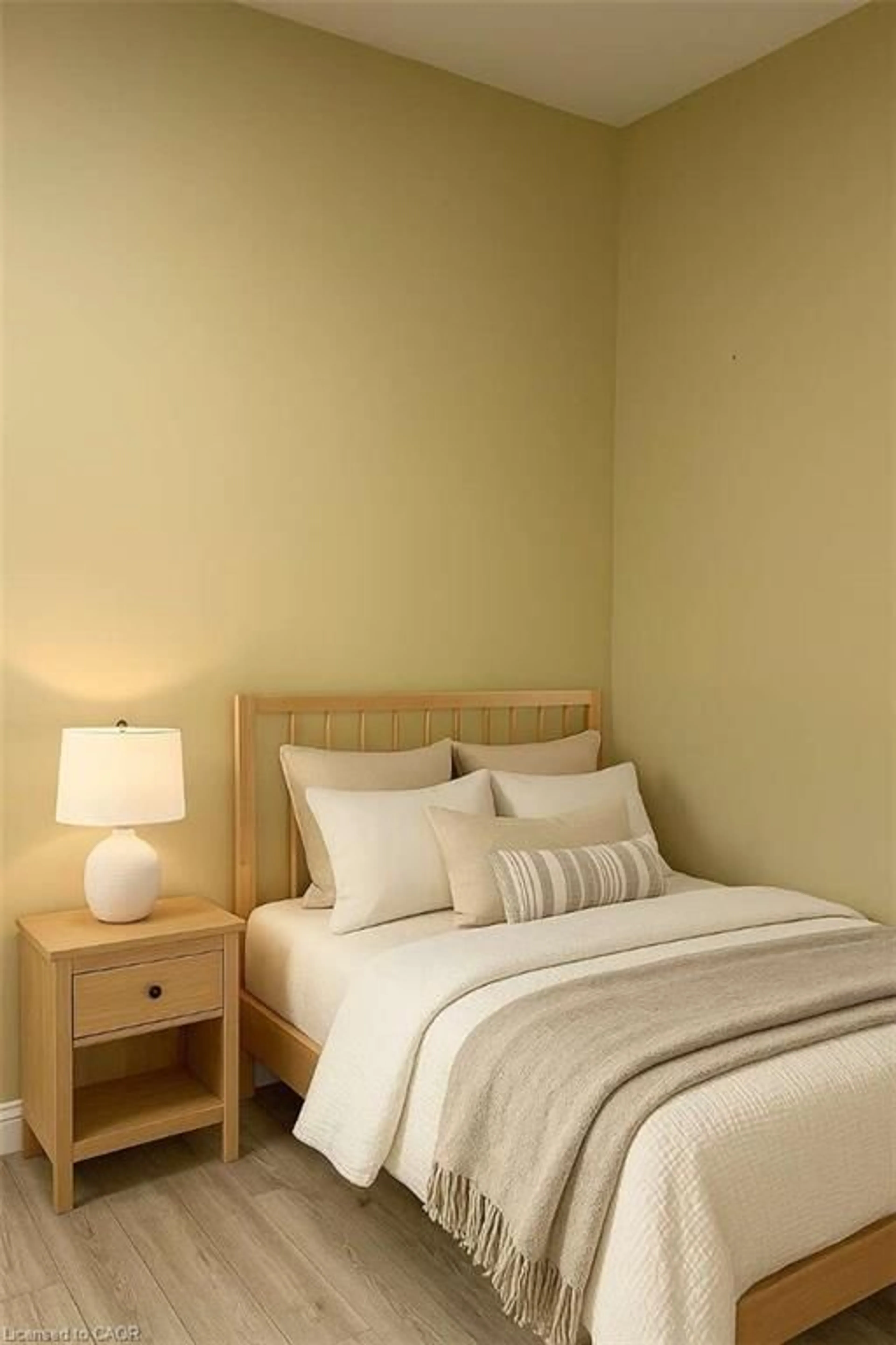 Bedroom with bed, wood/laminate floor for 60 Ontario St #3, Burk's Falls Ontario P0A 1C0