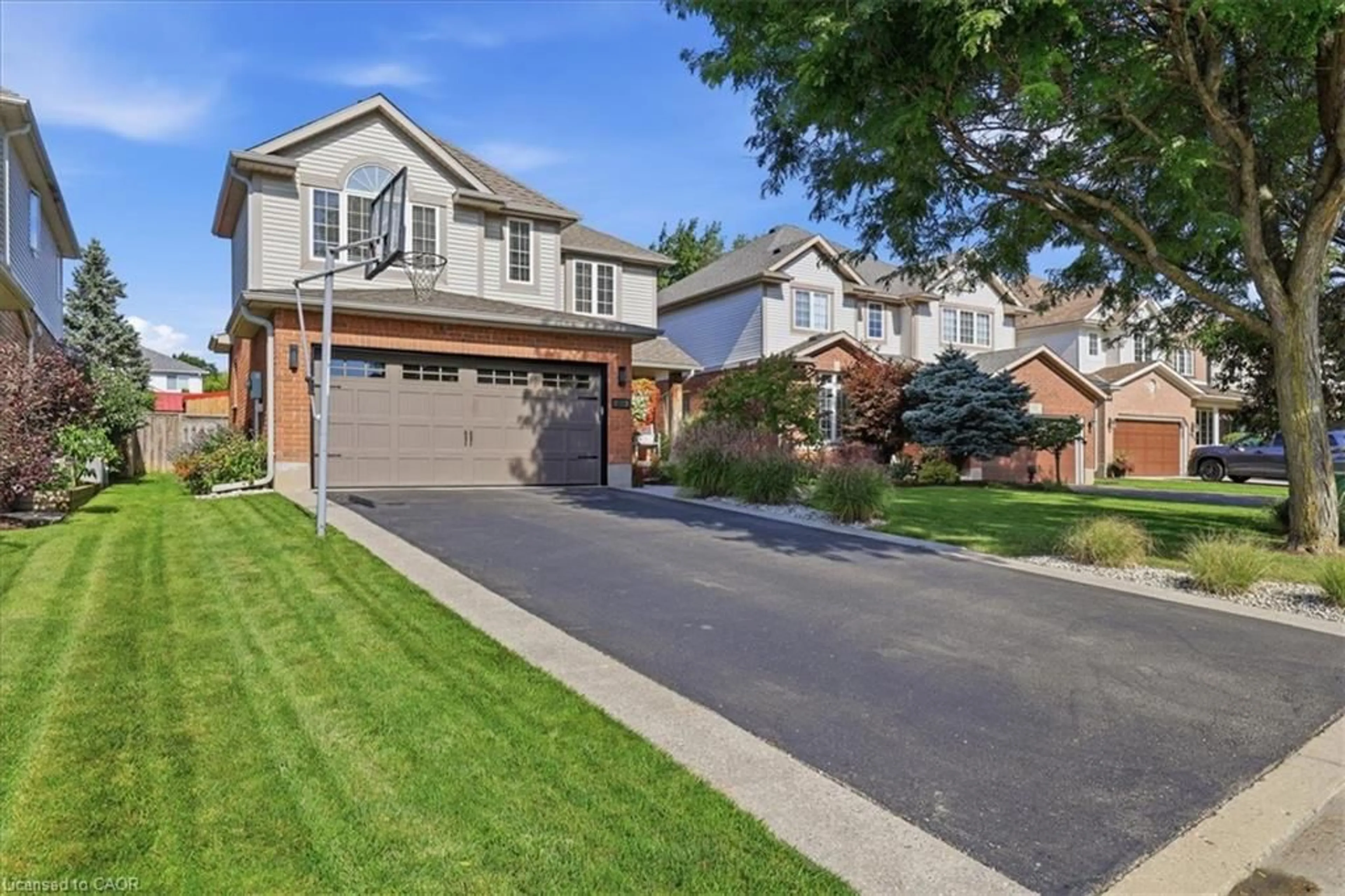 Home with brick exterior material, street for 454 Cabot Trail, Waterloo Ontario N2K 4C8