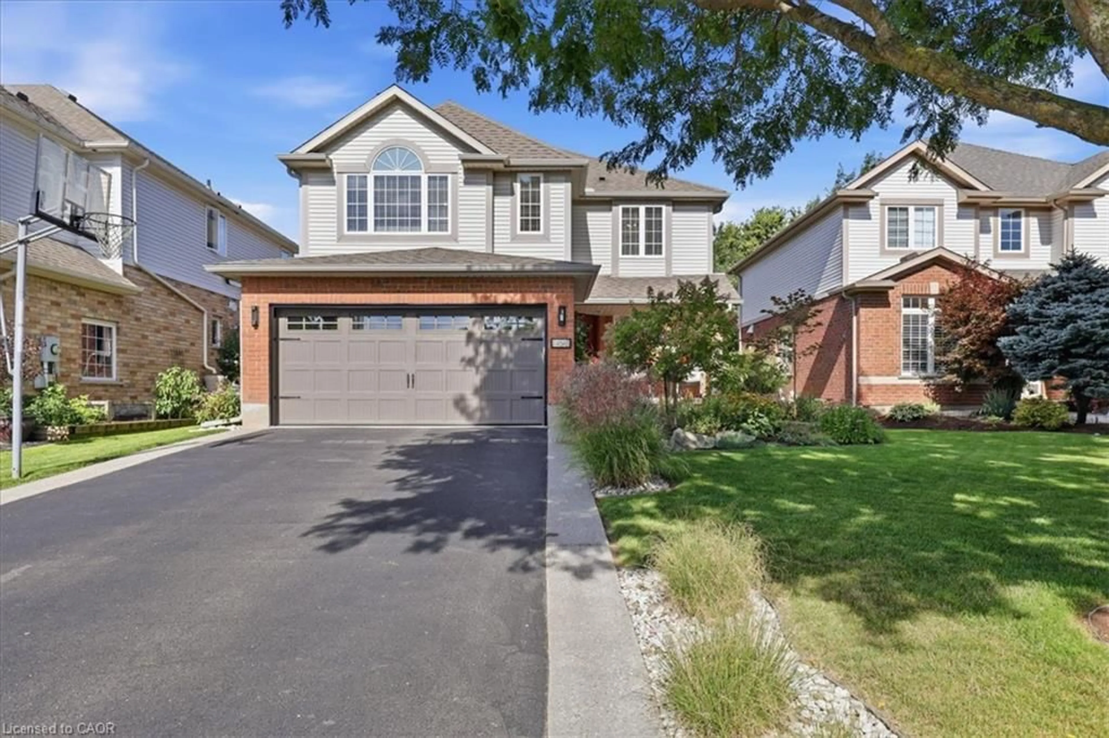 Home with brick exterior material, street for 454 Cabot Trail, Waterloo Ontario N2K 4C8