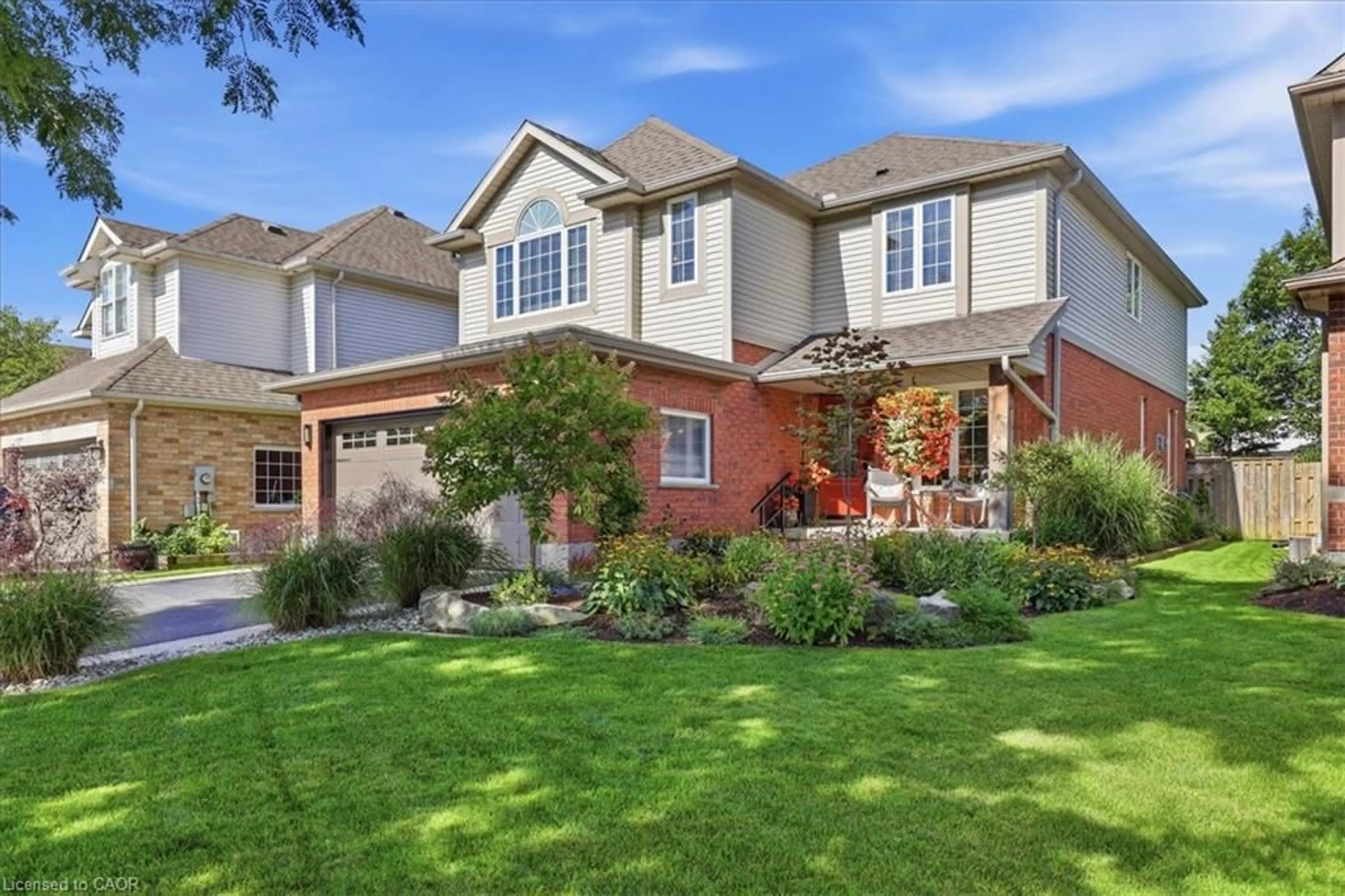 Home with brick exterior material, street for 454 Cabot Trail, Waterloo Ontario N2K 4C8