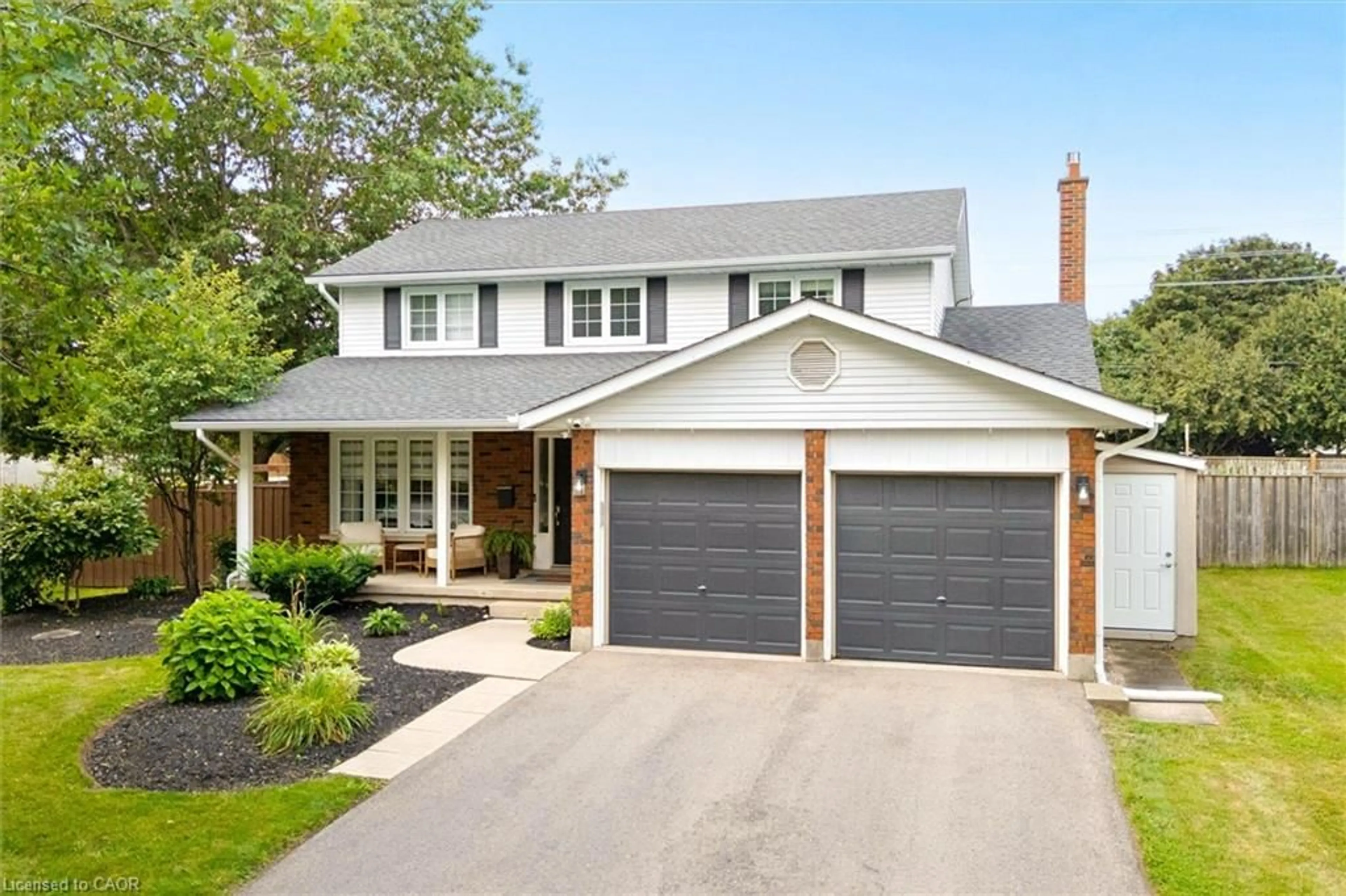 Home with brick exterior material, street for 315 Crimson Cres, Waterloo Ontario N2K 2T2