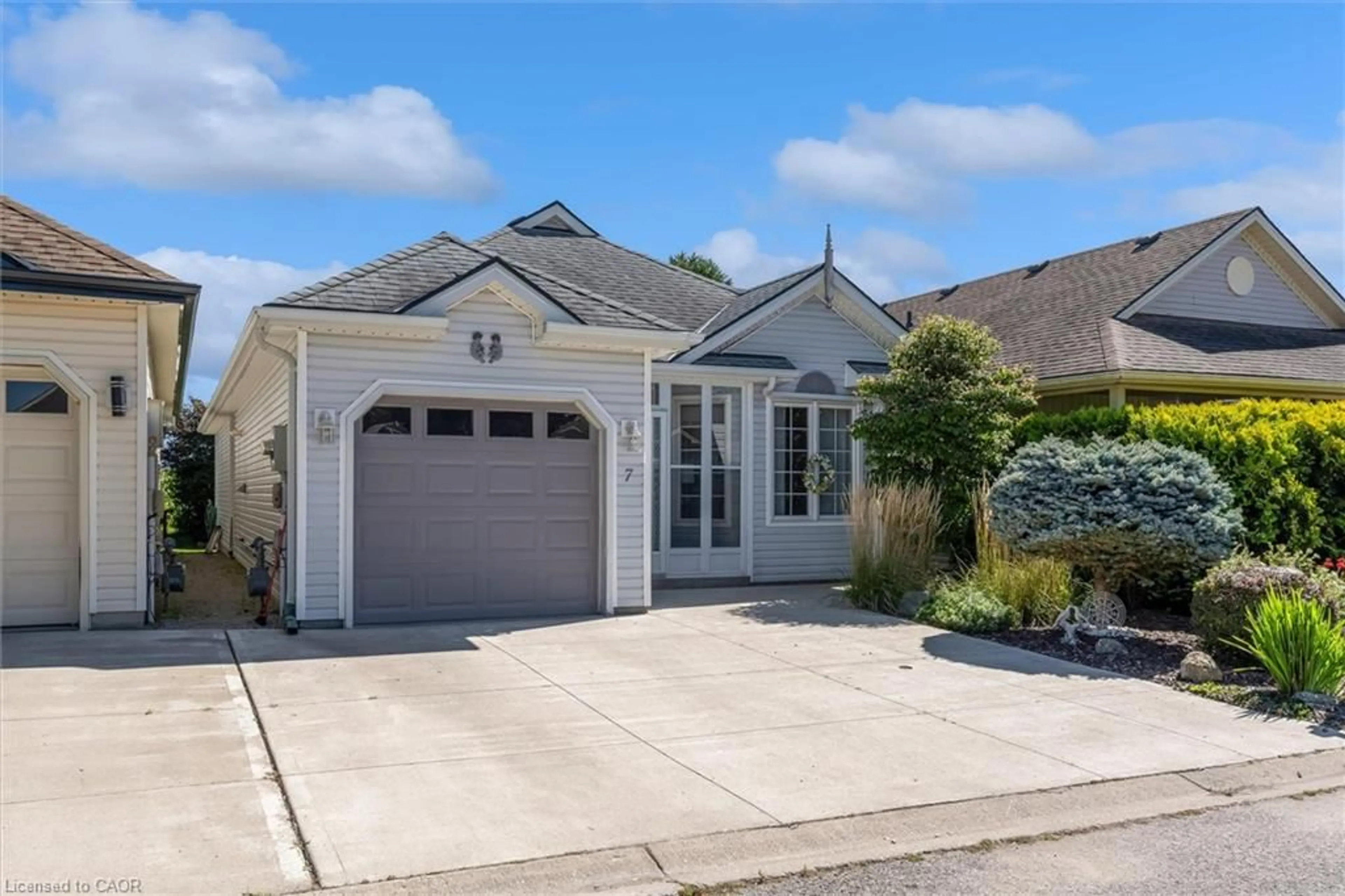 Home with vinyl exterior material, street for 7 Aspen Lane, Port Rowan Ontario N0E 1M0