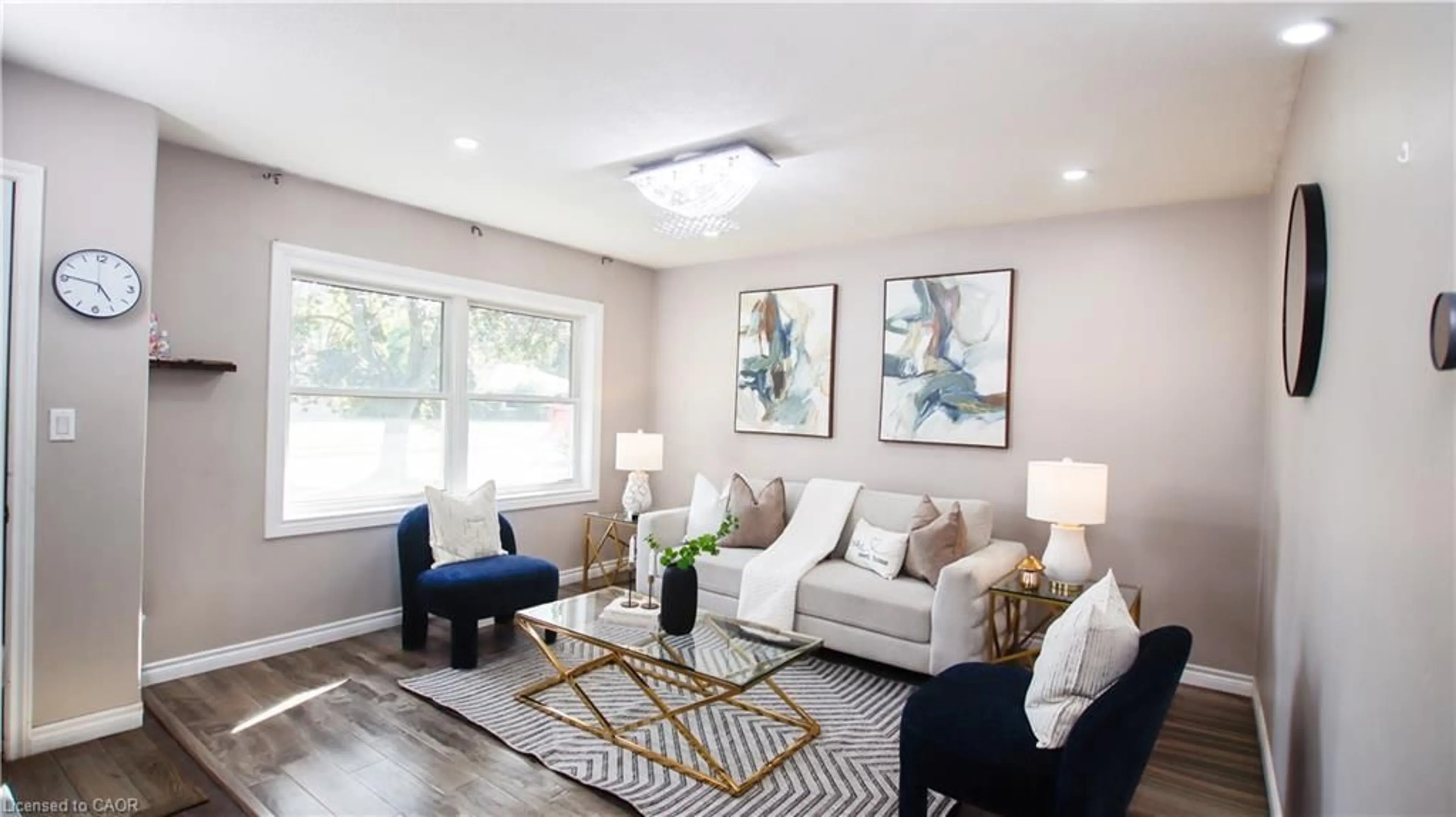 Living room with furniture, wood/laminate floor for 18 Clearview Dr, Cambridge Ontario N1S 1B2