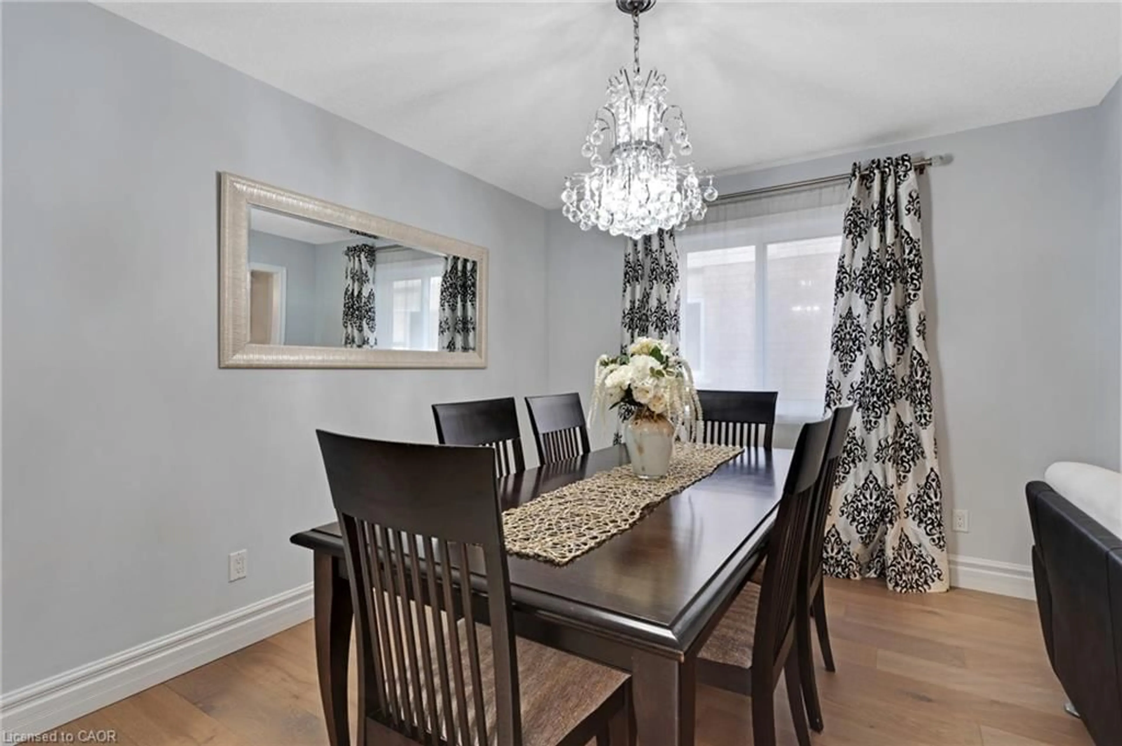 Dining room, wood/laminate floor for 343 Steepleridge St, Kitchener Ontario N2P 2X4