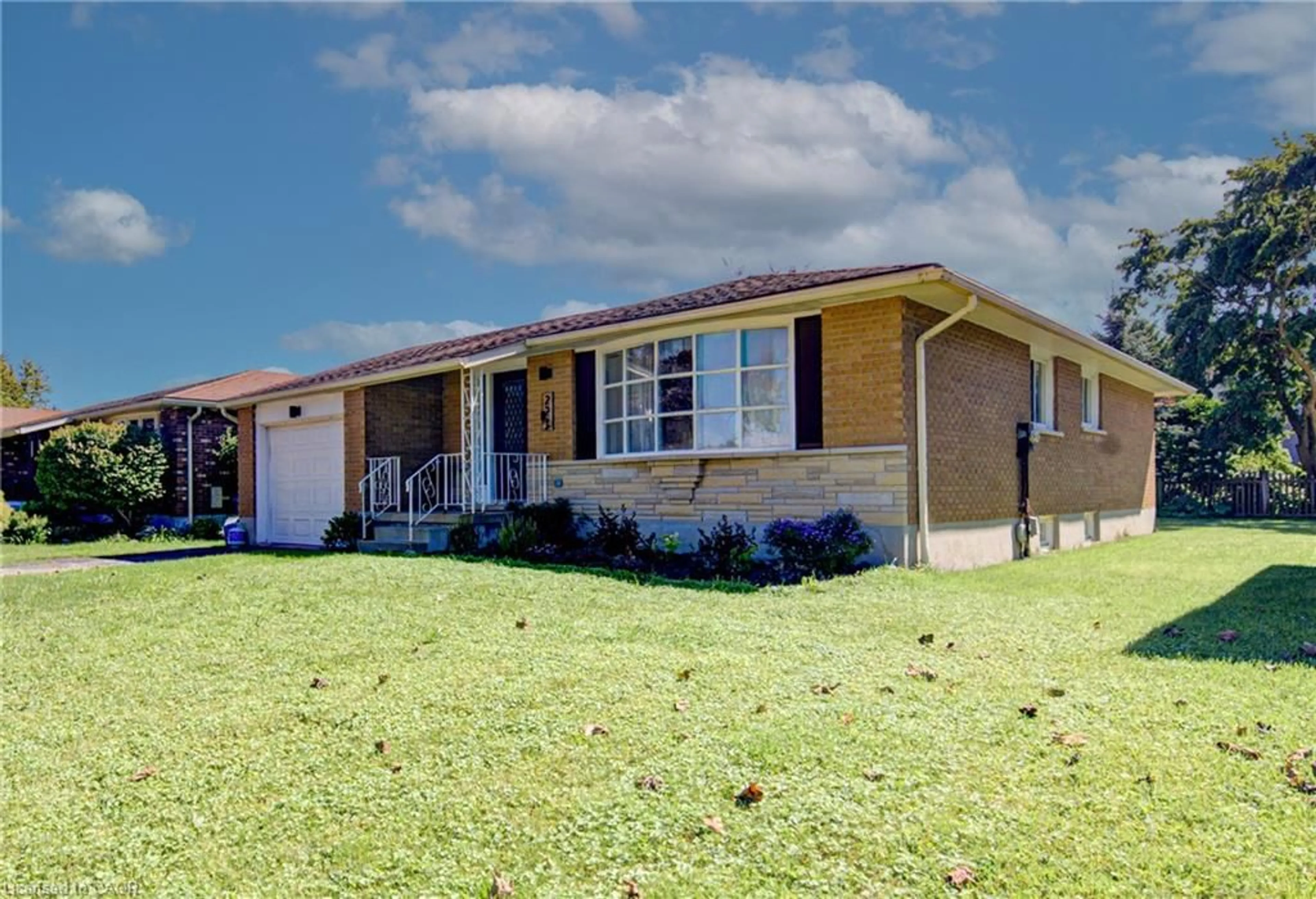 Home with brick exterior material, street for 221 Devon St, Stratford Ontario N5A 3A1