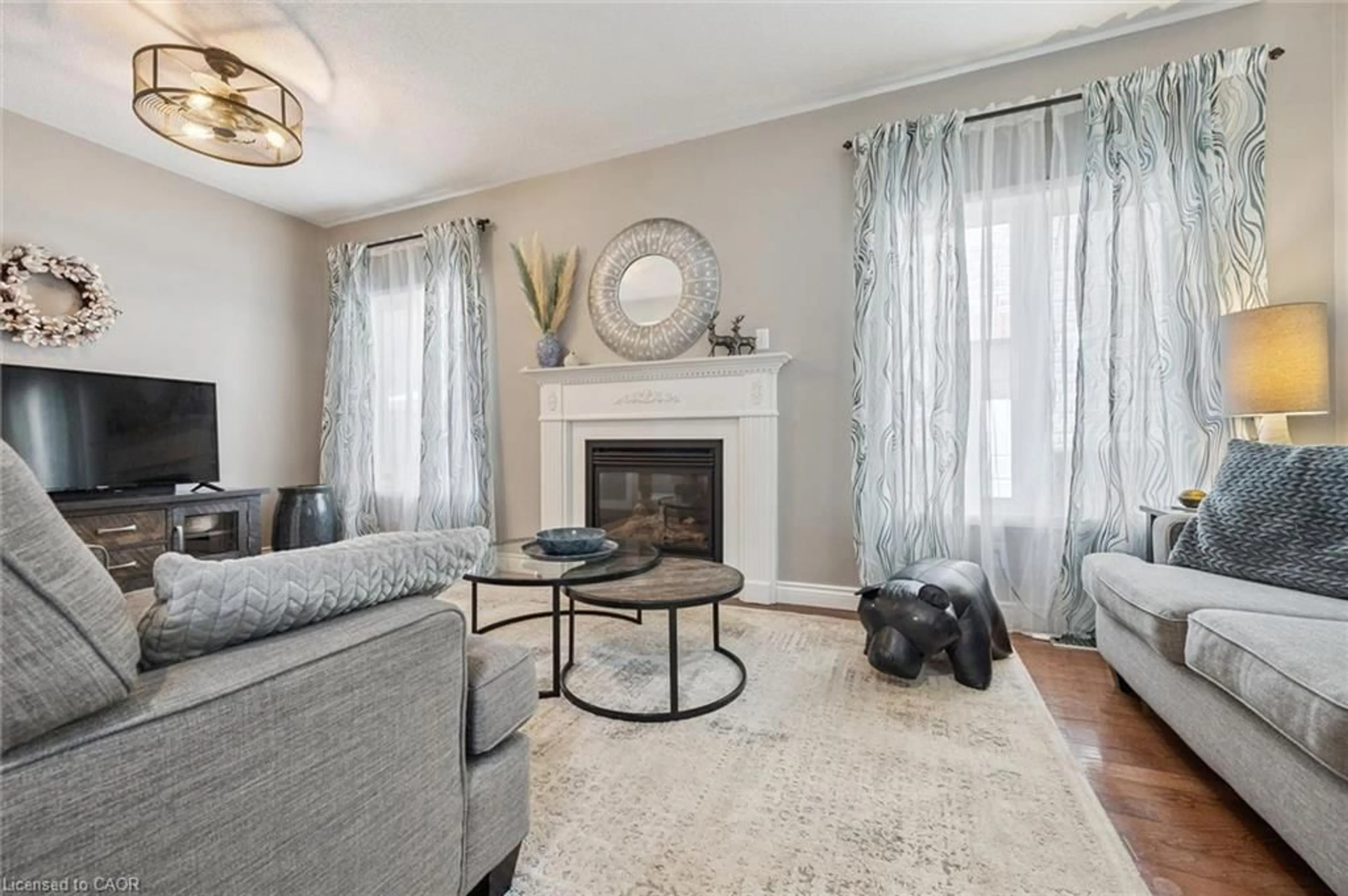 Living room with furniture, unknown for 97 Meadowlark Dr, Georgetown Ontario L7G 0C5