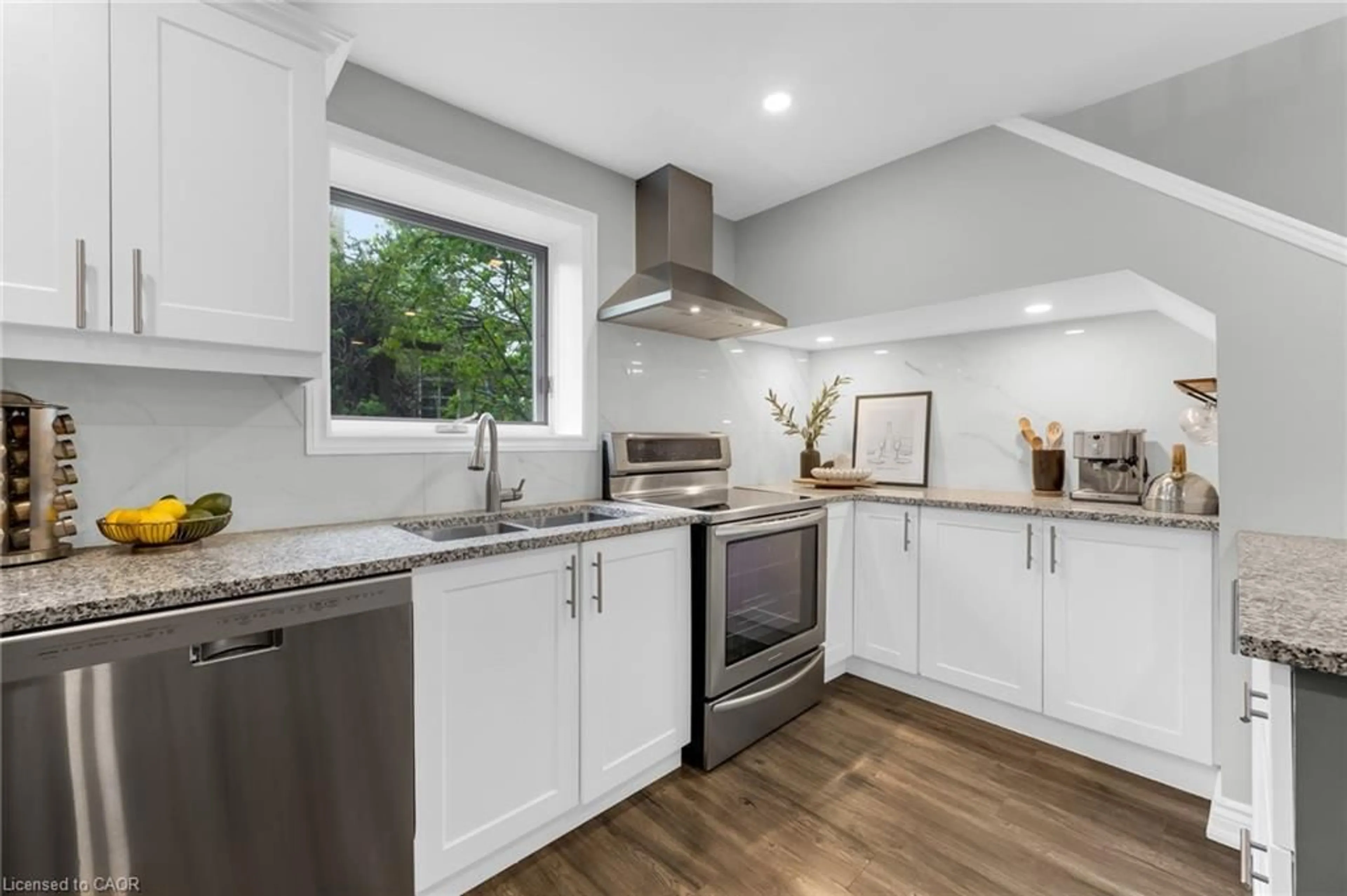 Open concept kitchen, wood/laminate floor for 175 Wellington St, Brantford Ontario N3S 3Z1