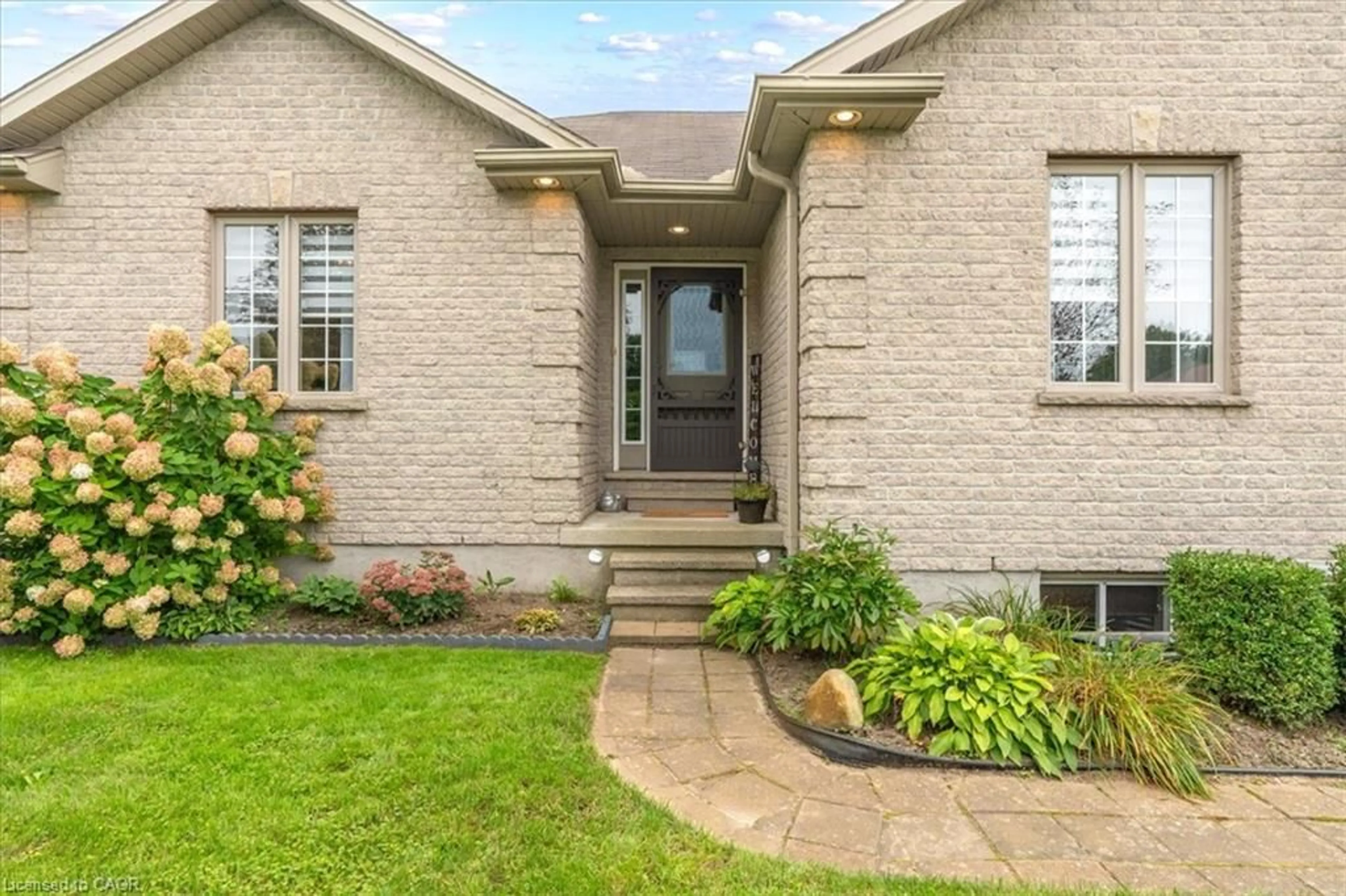 Home with brick exterior material, street for 515 Woodward Dr, Mount Brydges Ontario N0L 1W0