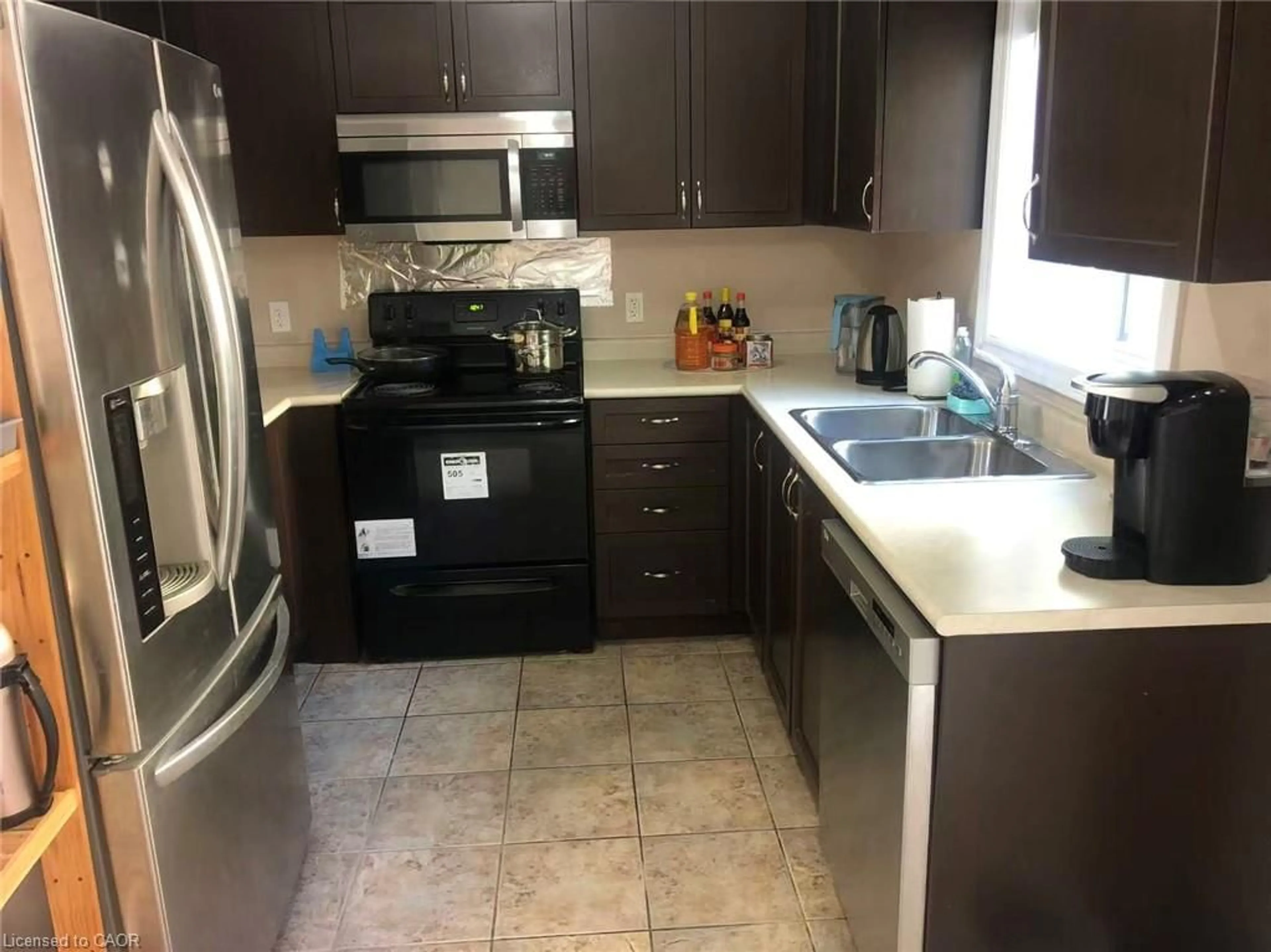 Standard kitchen, ceramic/tile floor for 55 Mooregate Cres #24, Kitchener Ontario N2M 2E9