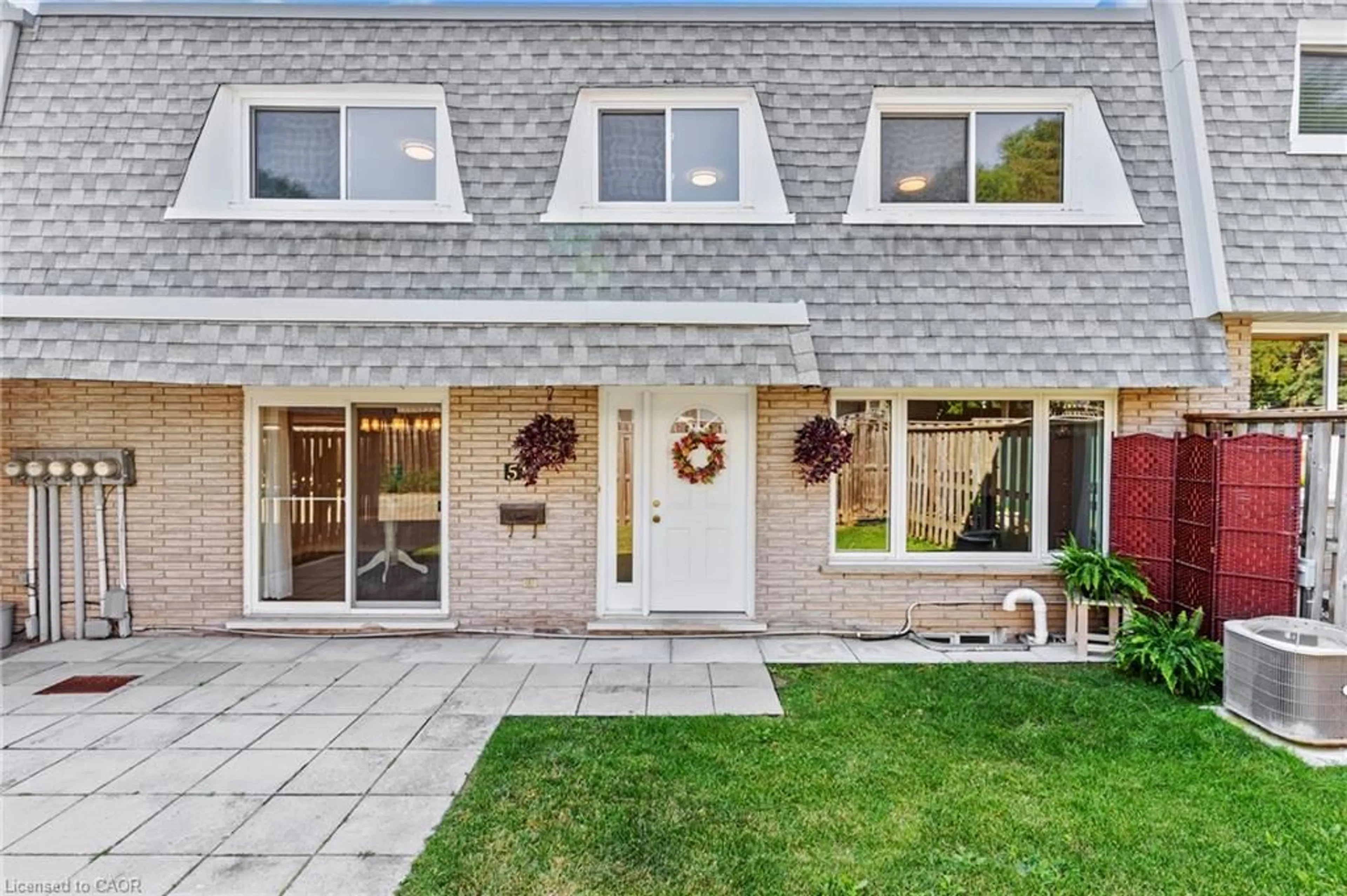Home with brick exterior material, street for 14 Williamsburg Rd #51, Kitchener Ontario N2E 1W1