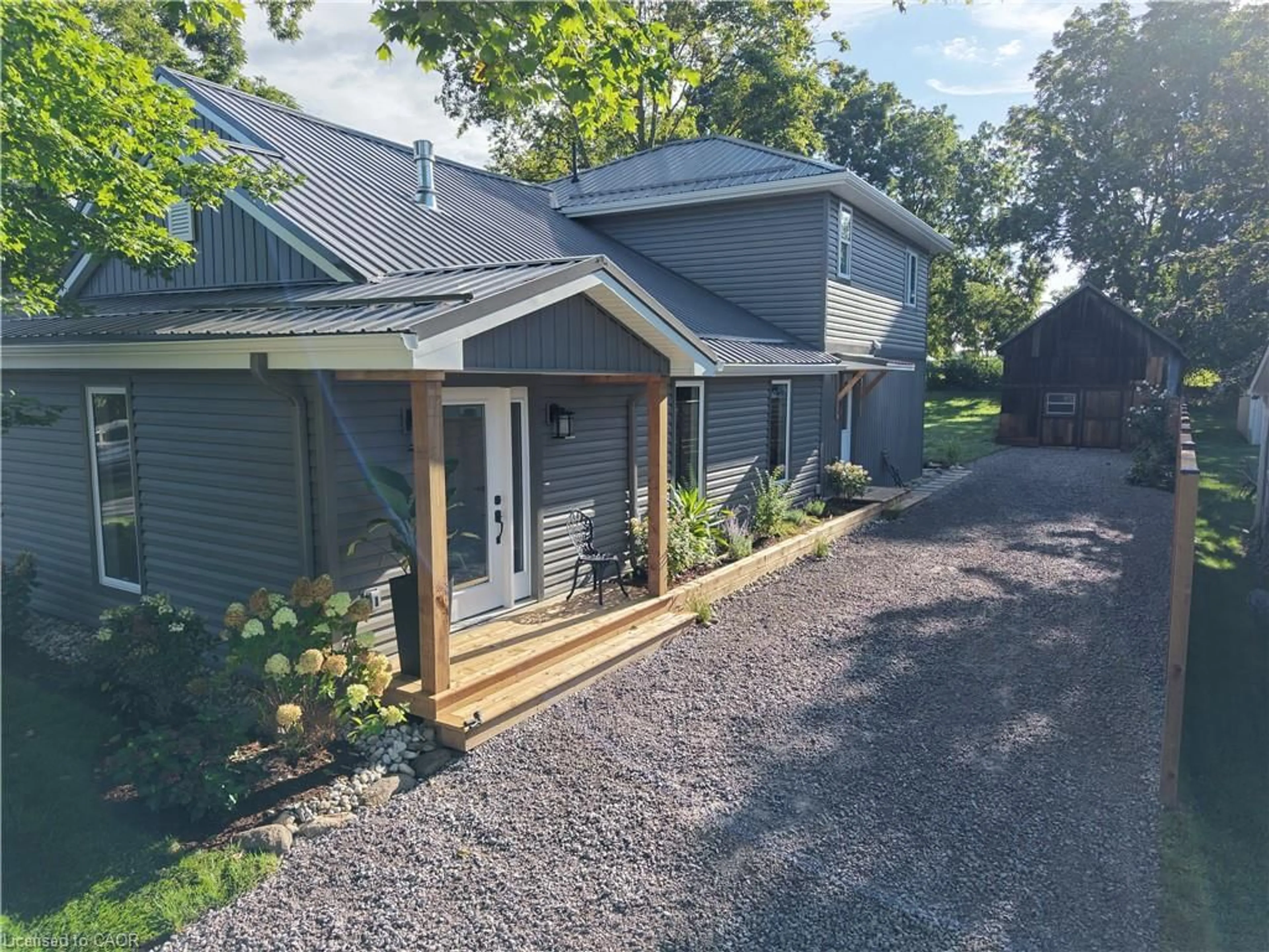 A pic from outside/outdoor area/front of a property/back of a property/a pic from drone, unknown for 250 Old Highway 24, Waterford Ontario N0E 1Y0