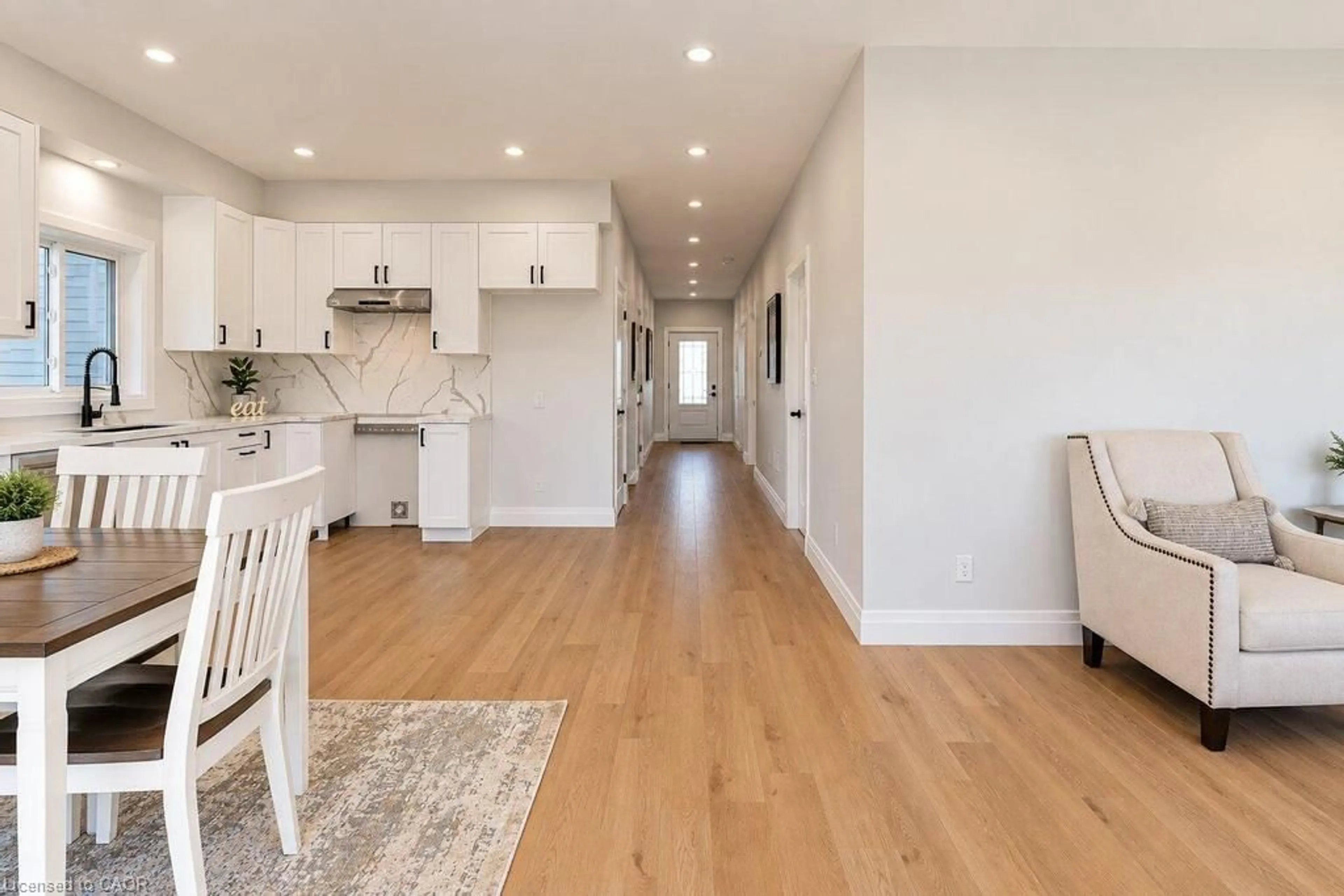 Open concept kitchen, wood/laminate floor for 86 Pike Creek Dr, Cayuga Ontario N0E 1E0