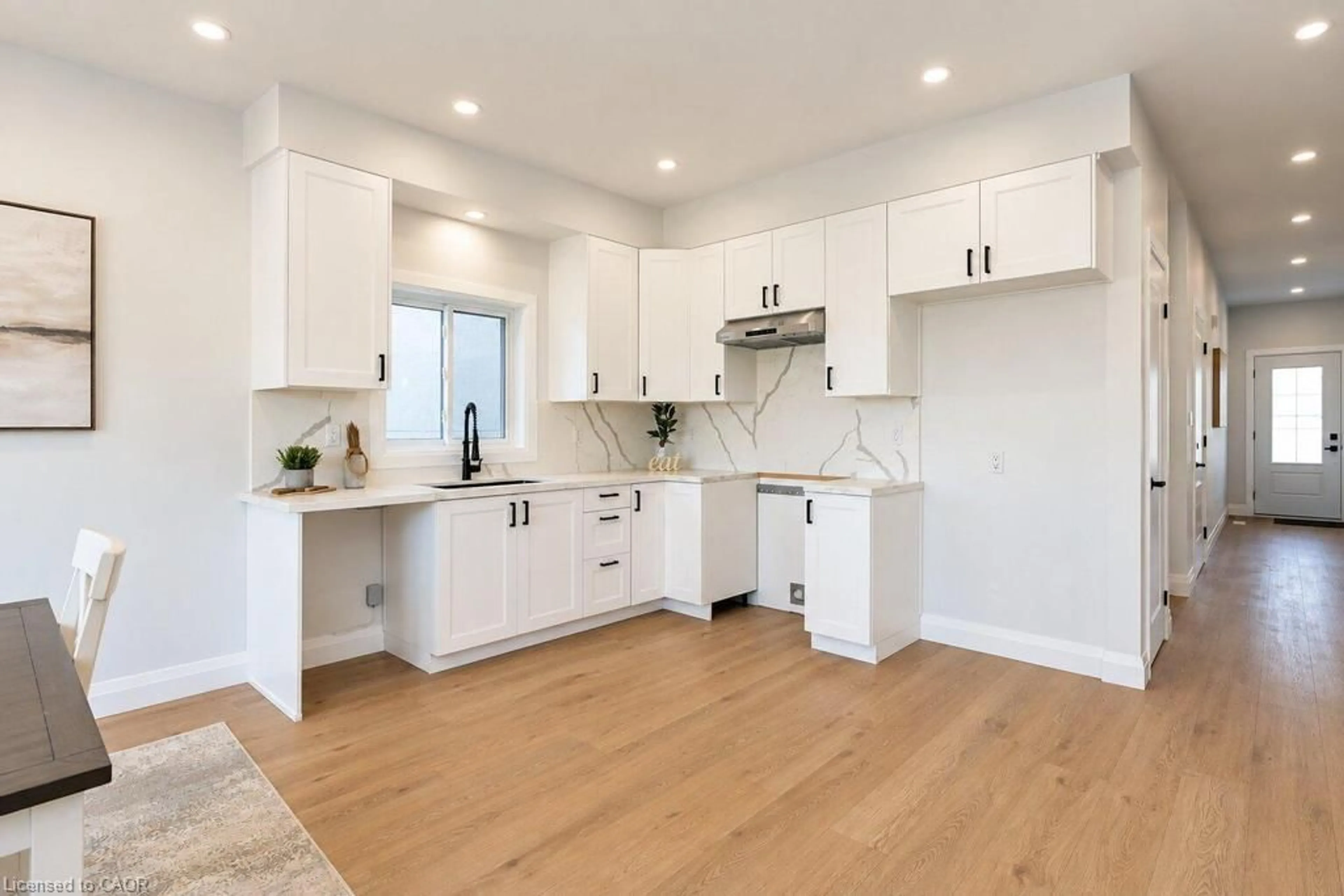 Open concept kitchen, wood/laminate floor for 86 Pike Creek Dr, Cayuga Ontario N0E 1E0