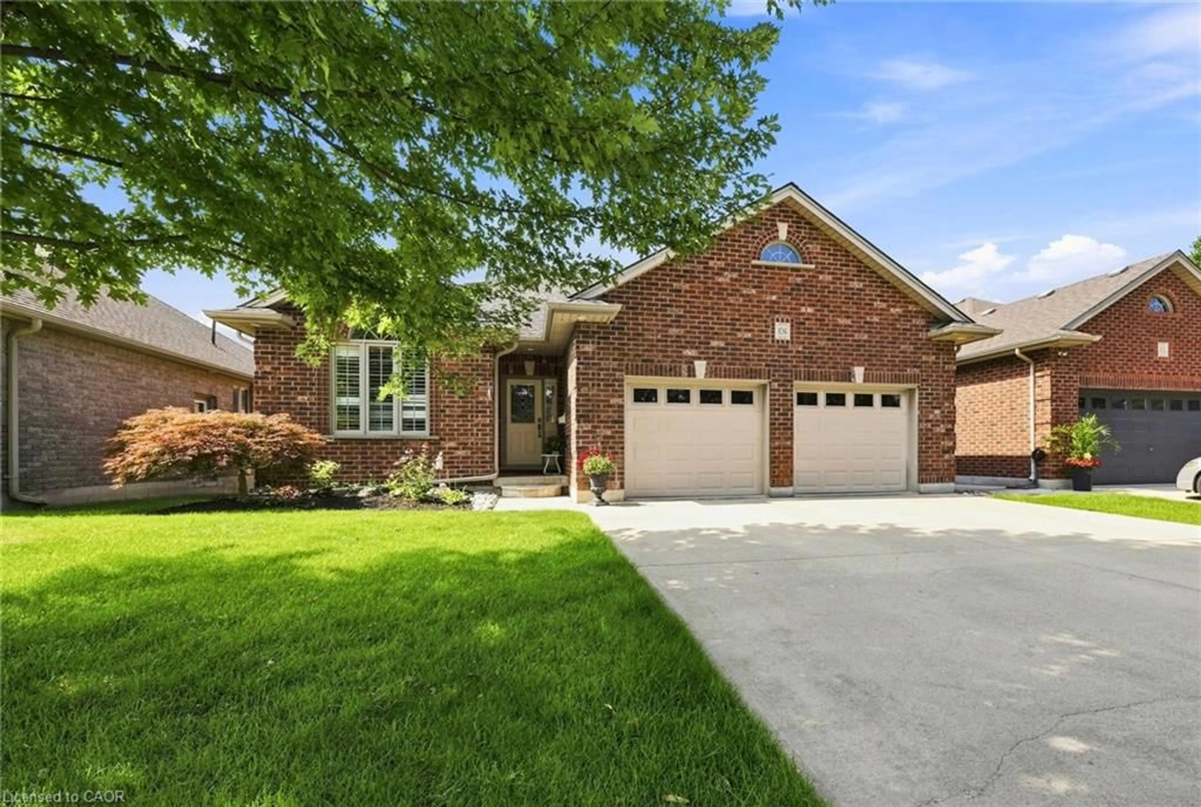 Home with brick exterior material, street for 106 Kingfisher Ave, Woodstock Ontario N4T 1T7