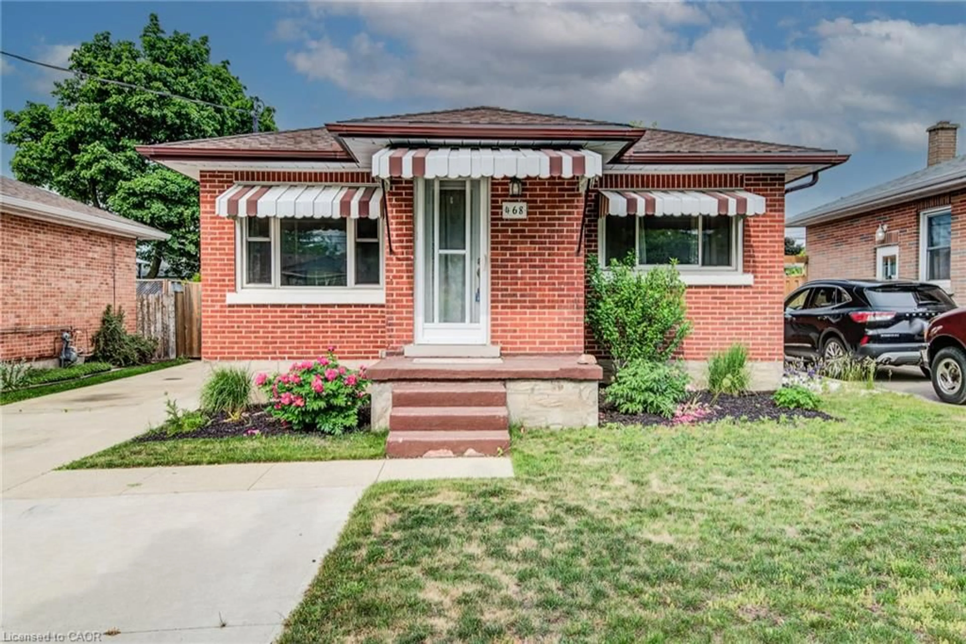 Home with brick exterior material, street for 468 Highland Rd, Kitchener Ontario N2M 3W7