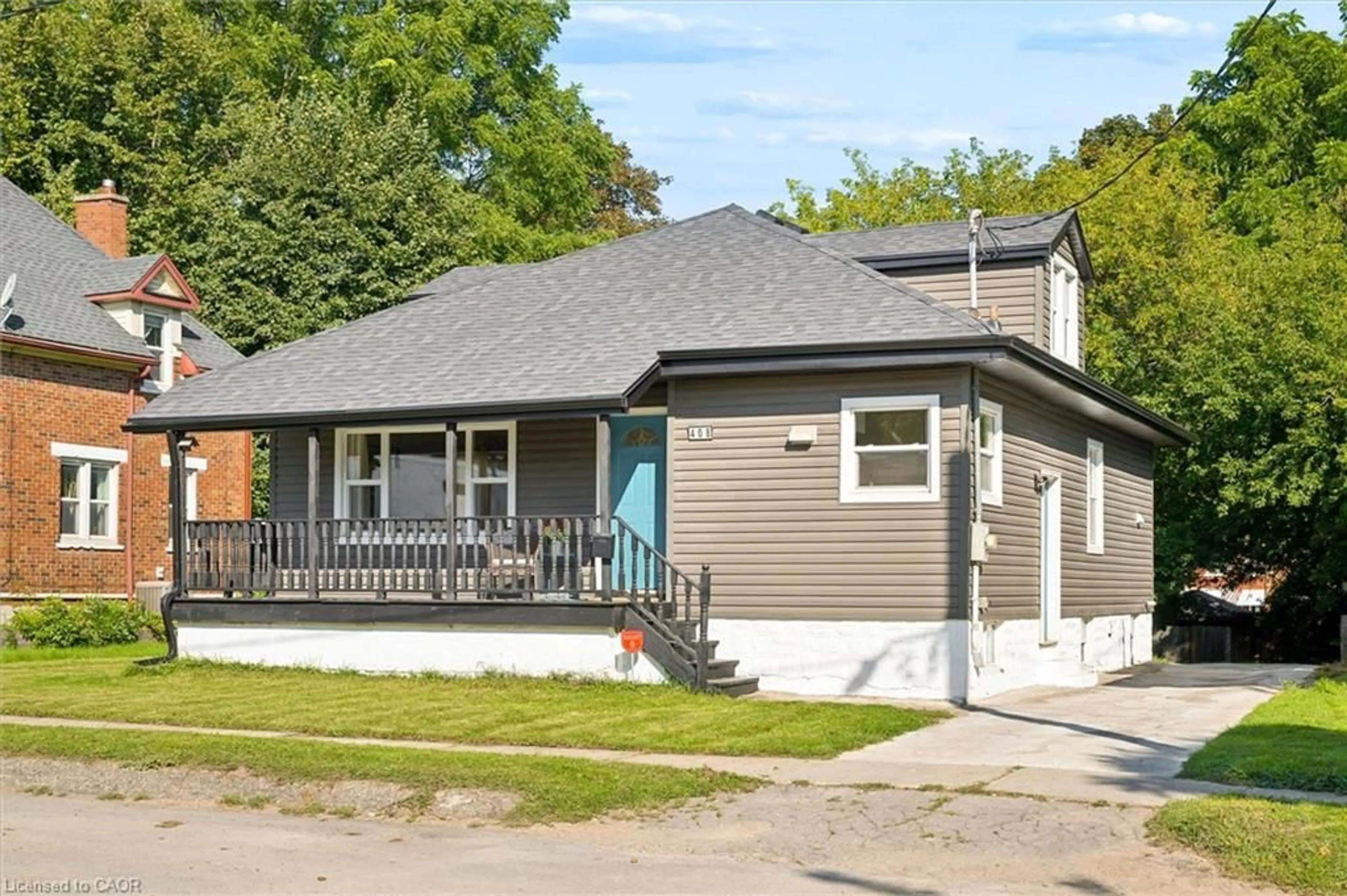 Home with vinyl exterior material, street for 408 Breithaupt St, Kitchener Ontario N2H 5H9