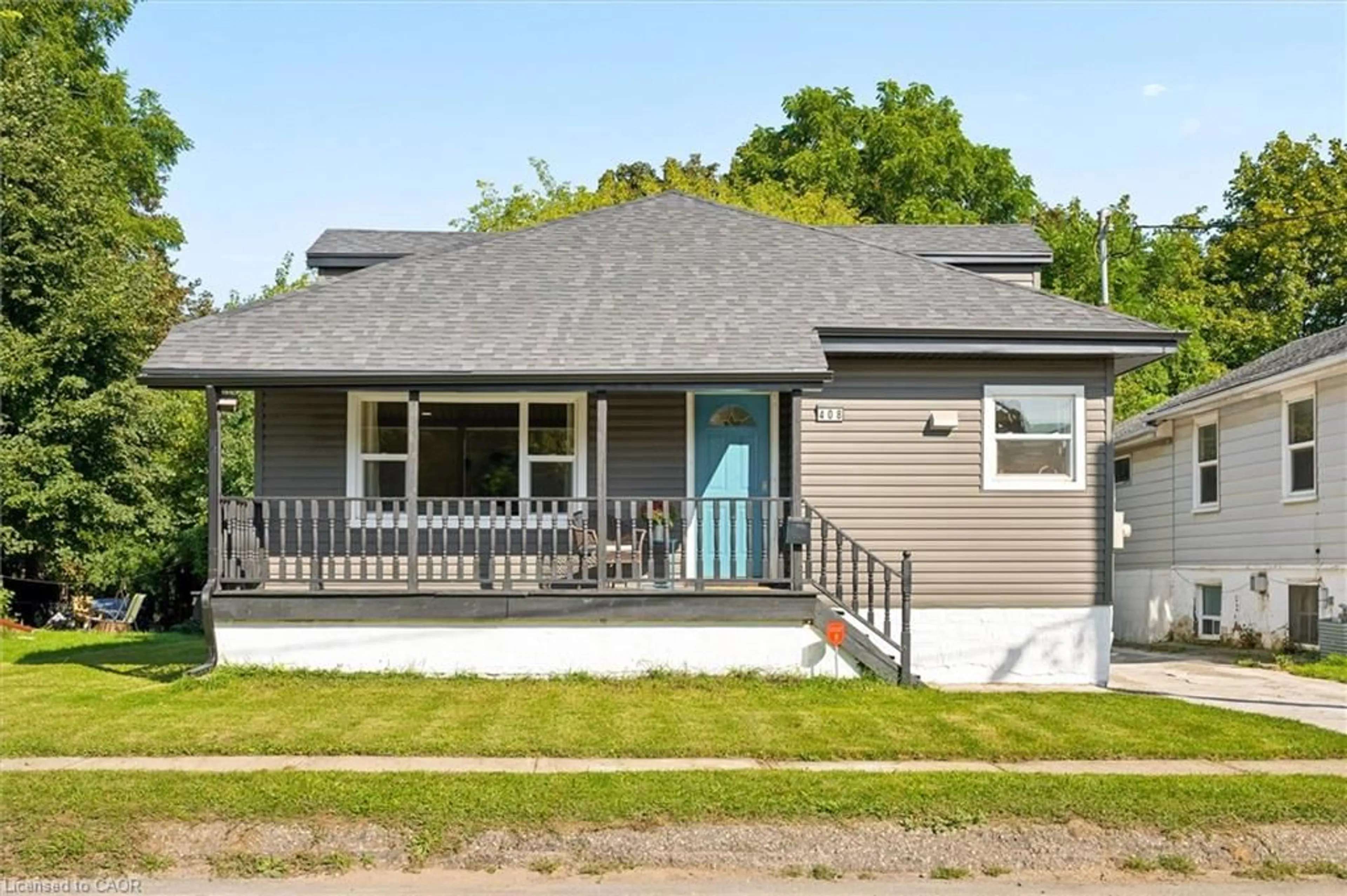 Home with vinyl exterior material, street for 408 Breithaupt St, Kitchener Ontario N2H 5H9