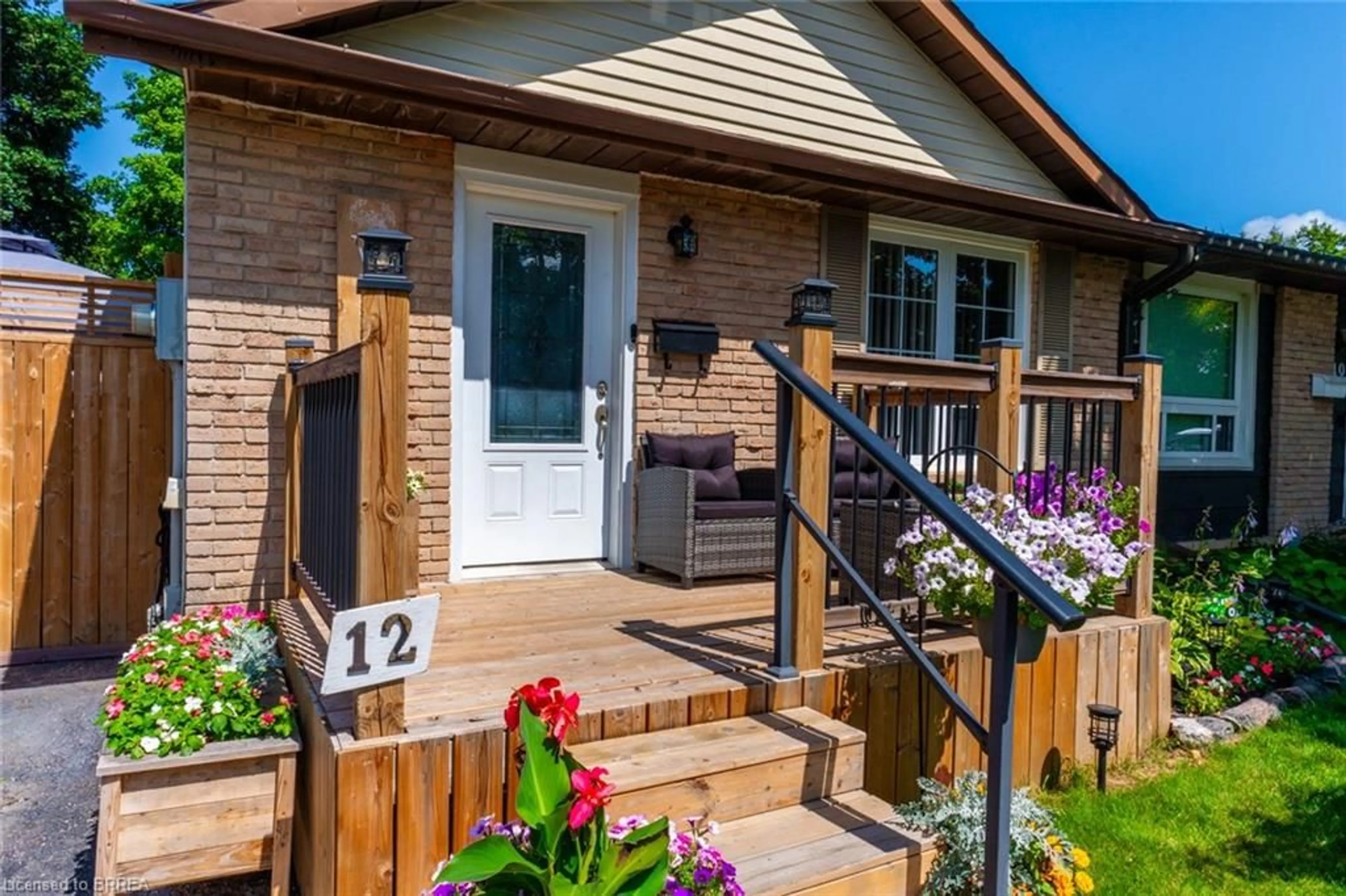 Home with brick exterior material, street for 12 Ponytrail Dr, Brantford Ontario N3P 1J8