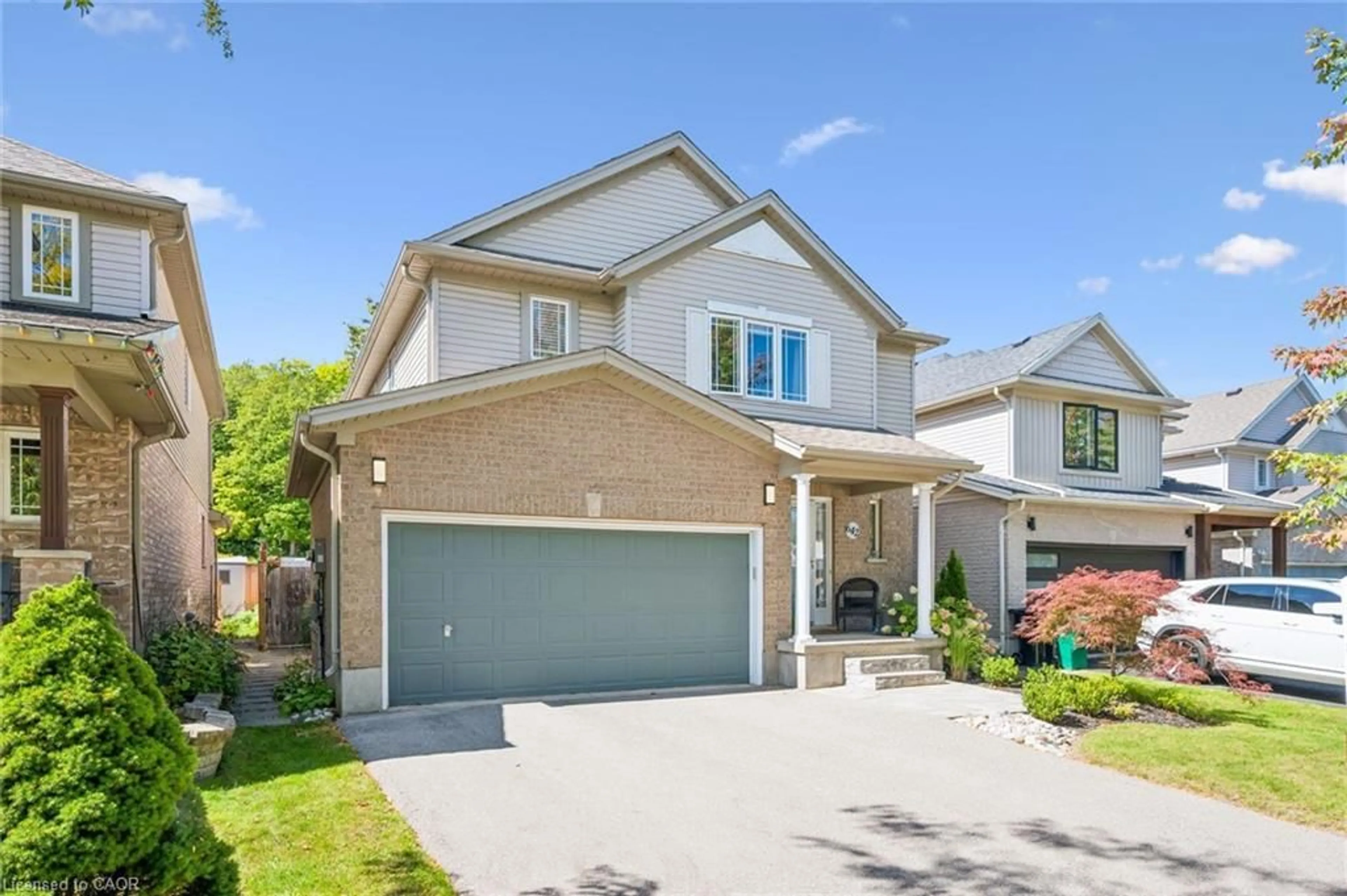 Home with brick exterior material, street for 642 Interlaken Dr, Waterloo Ontario N2T 2Y5
