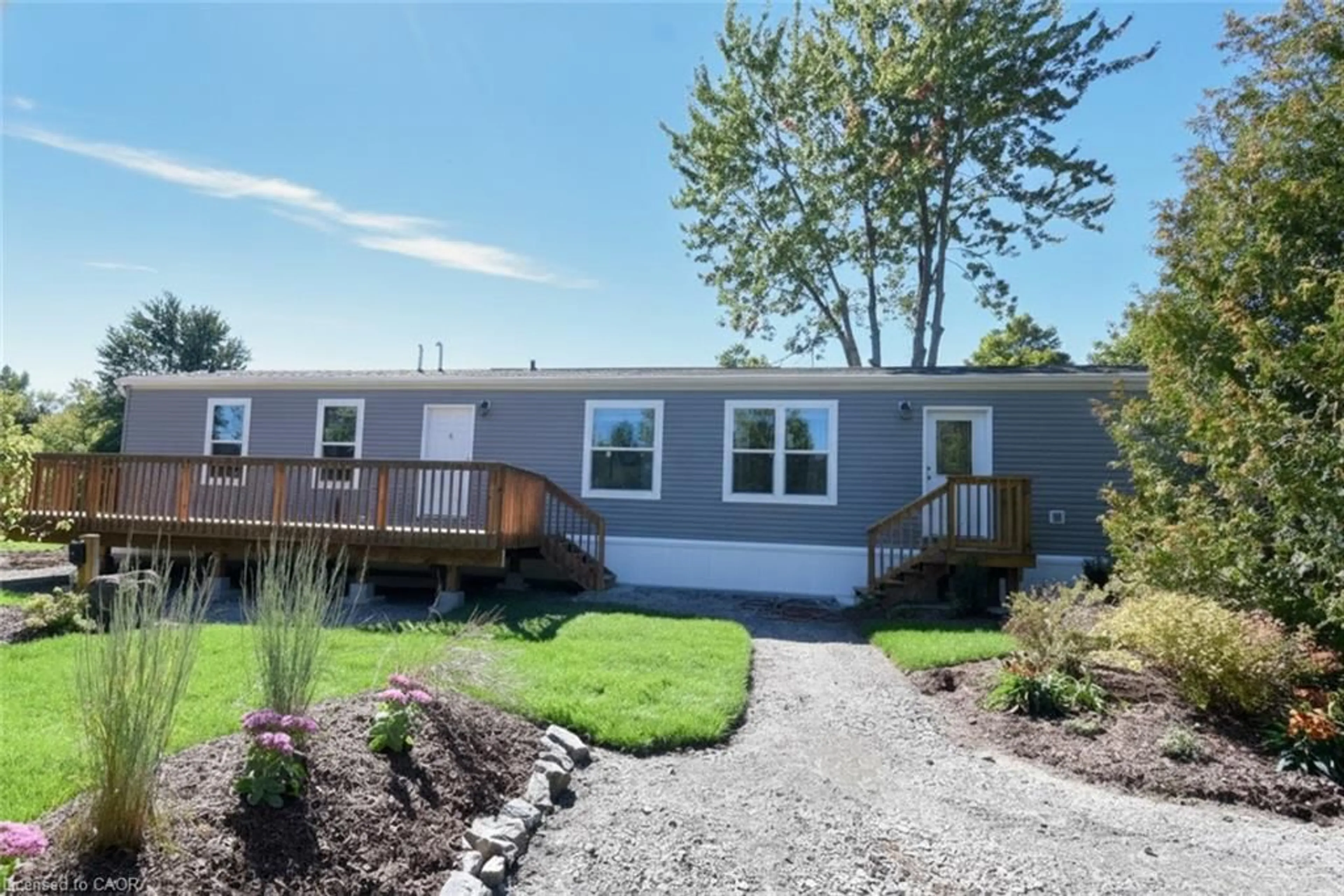 Home with vinyl exterior material, street for 1085 Concession Road 10 Rd #64, Flamborough Ontario N0B 2J0