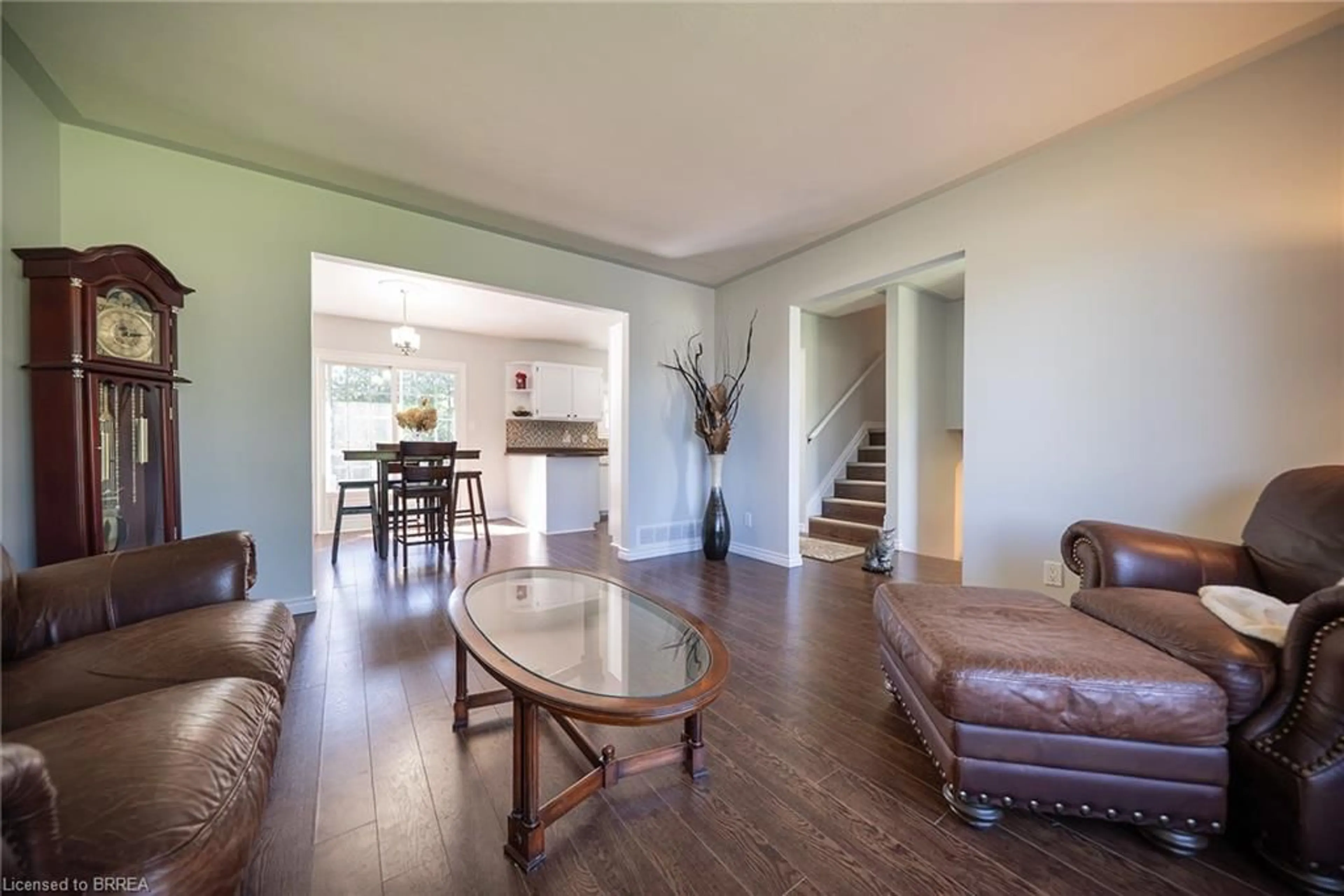 Living room with furniture, wood/laminate floor for 218 Mechanic St, Waterford Ontario N0E 1Y0