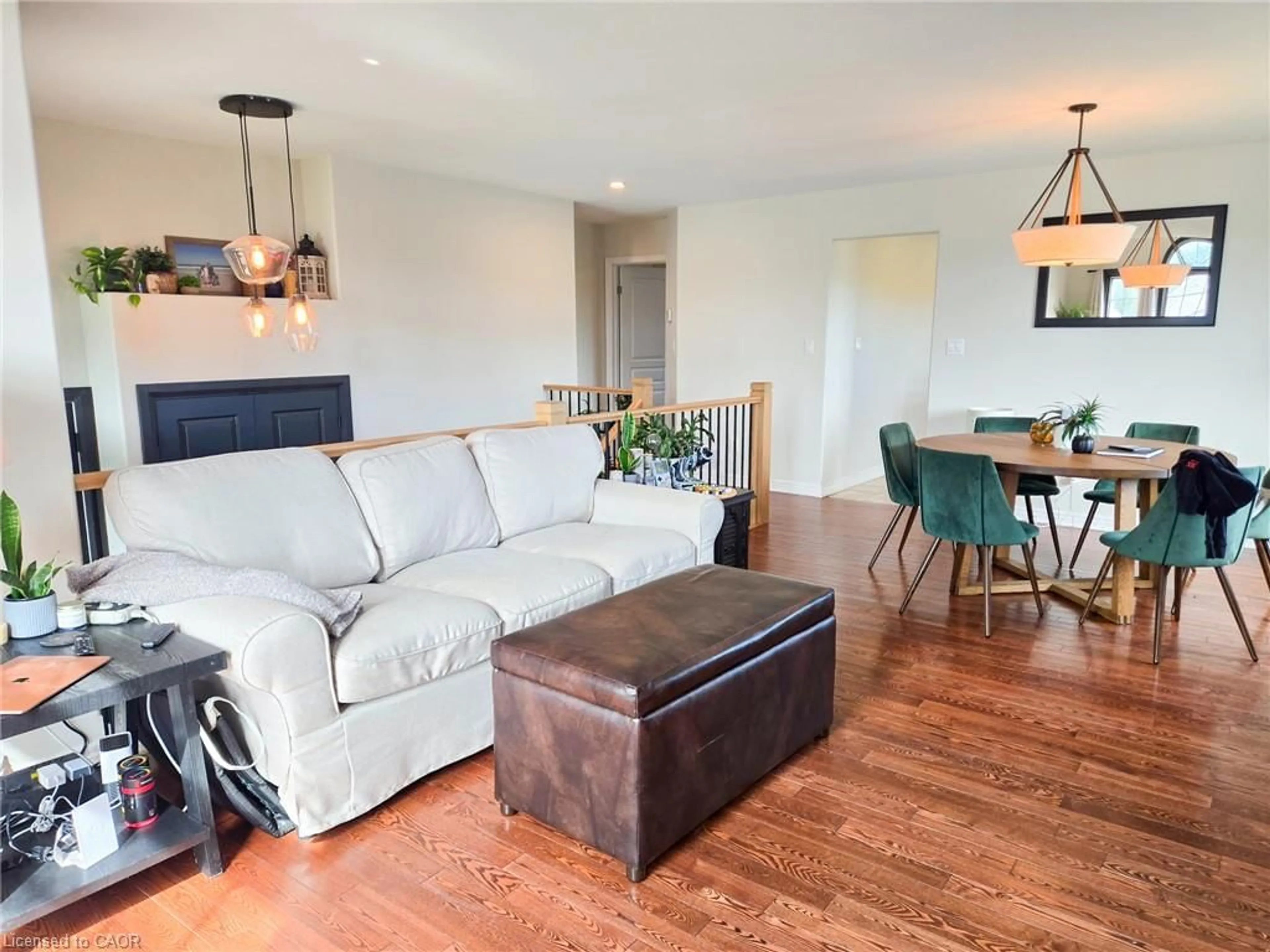 Living room with furniture, wood/laminate floor for 1 Driftwood Dr, Simcoe Ontario N3Y 5N1