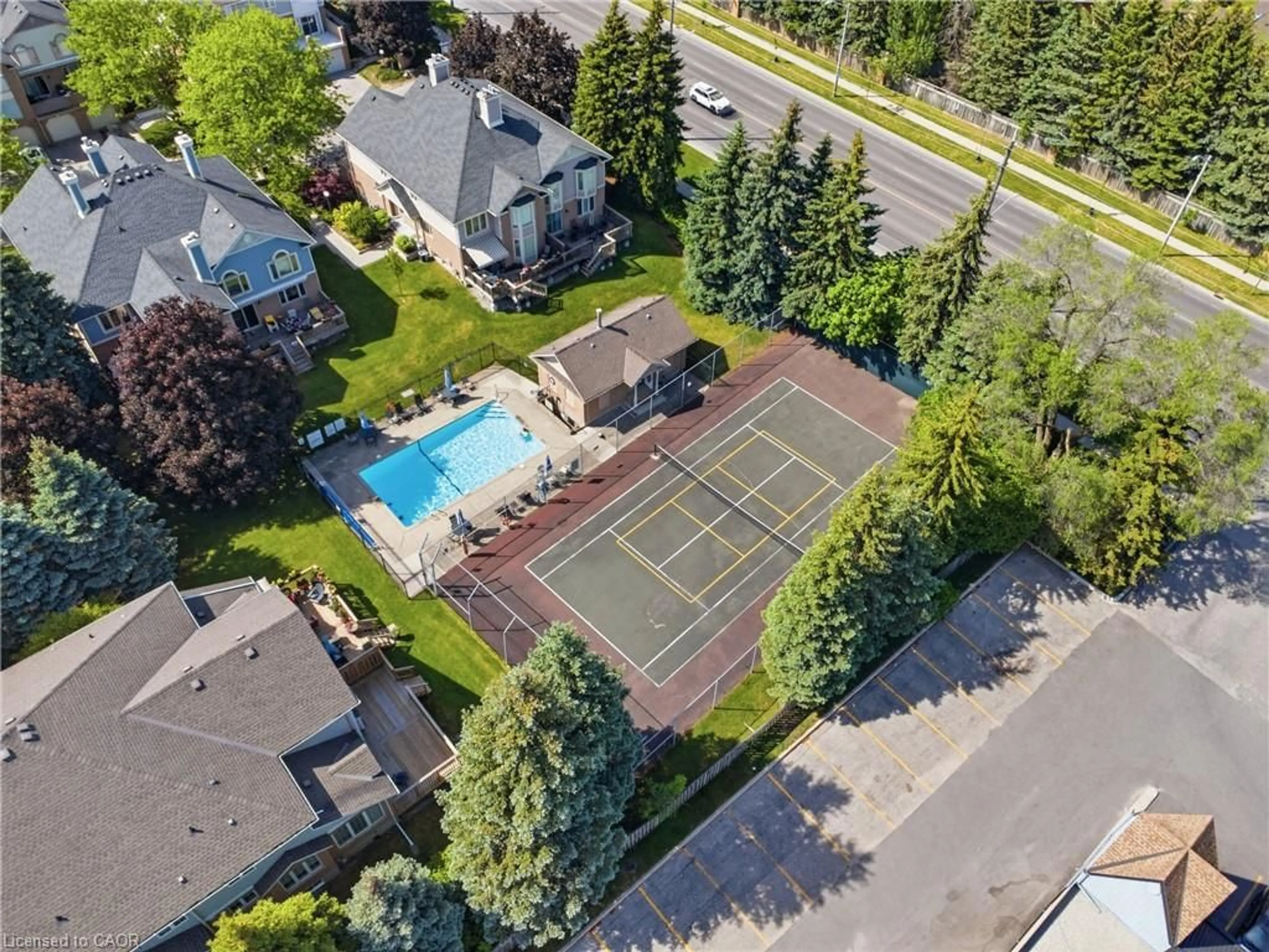 A pic from outside/outdoor area/front of a property/back of a property/a pic from drone, street for 941 Gordon St #49, Guelph Ontario N1G 4R9