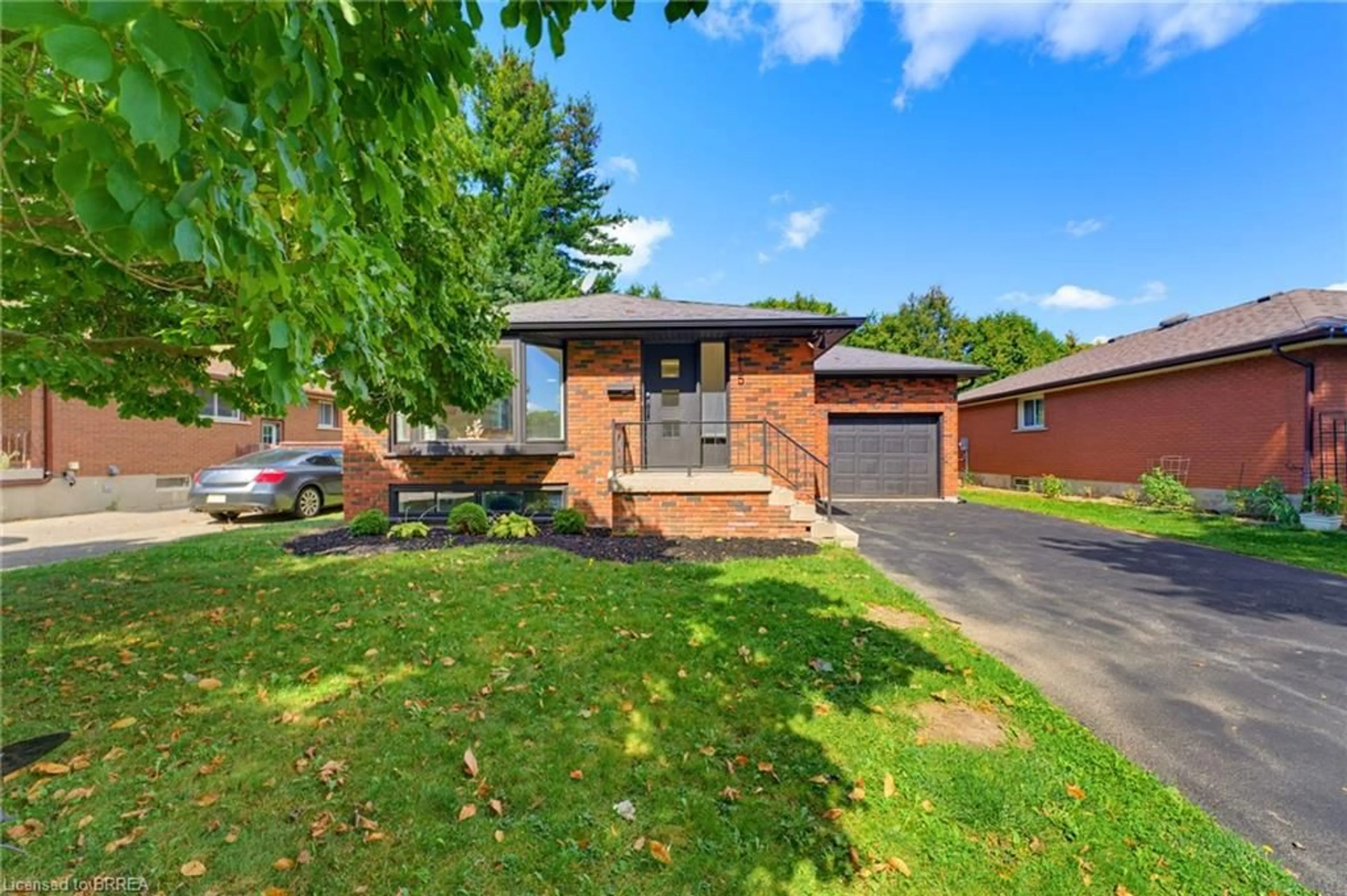 Home with brick exterior material, street for 115 Evelyn St, Brantford Ontario N3R 3H4