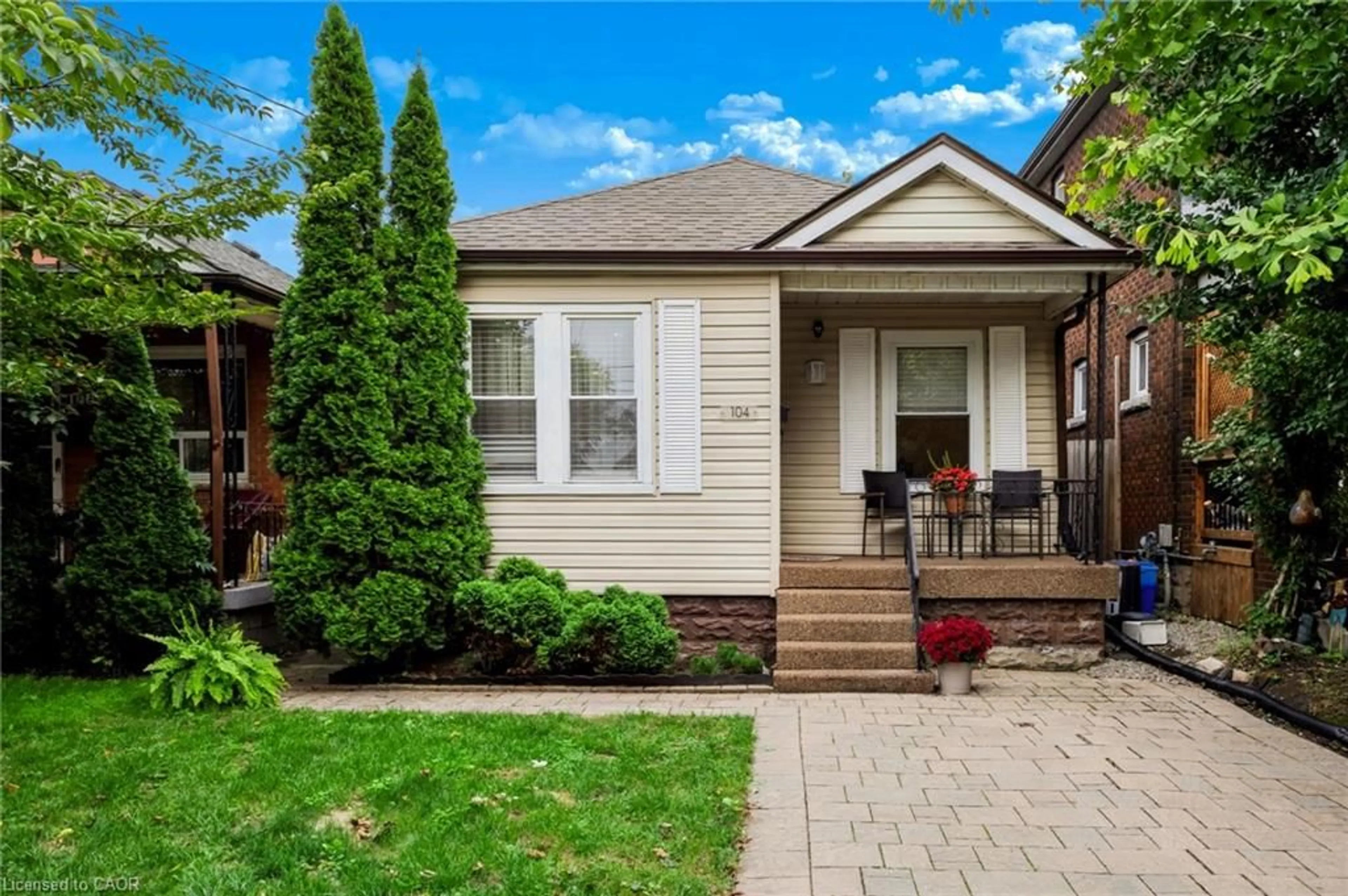 Home with vinyl exterior material, street for 104 Niagara St, Hamilton Ontario L8L 6A7