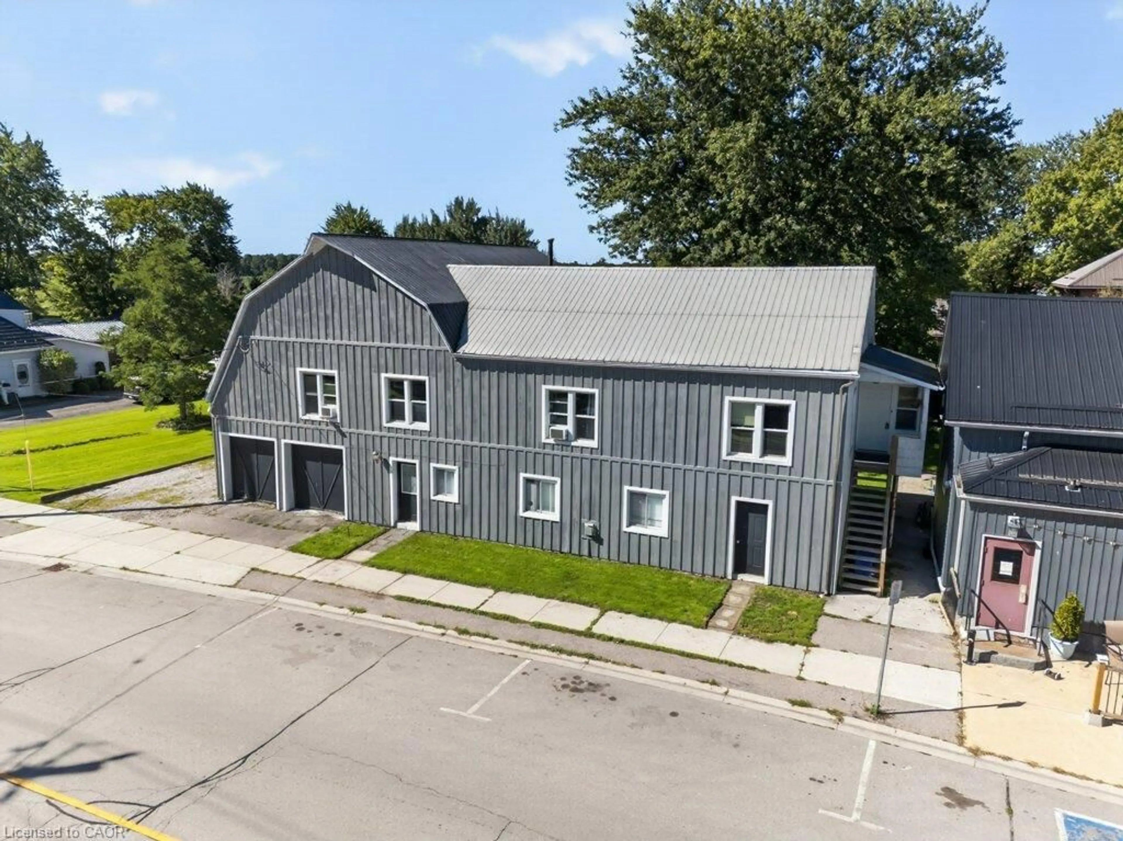A pic from outside/outdoor area/front of a property/back of a property/a pic from drone, building for 4 Erie Ave, Fisherville Ontario N0A 1G0