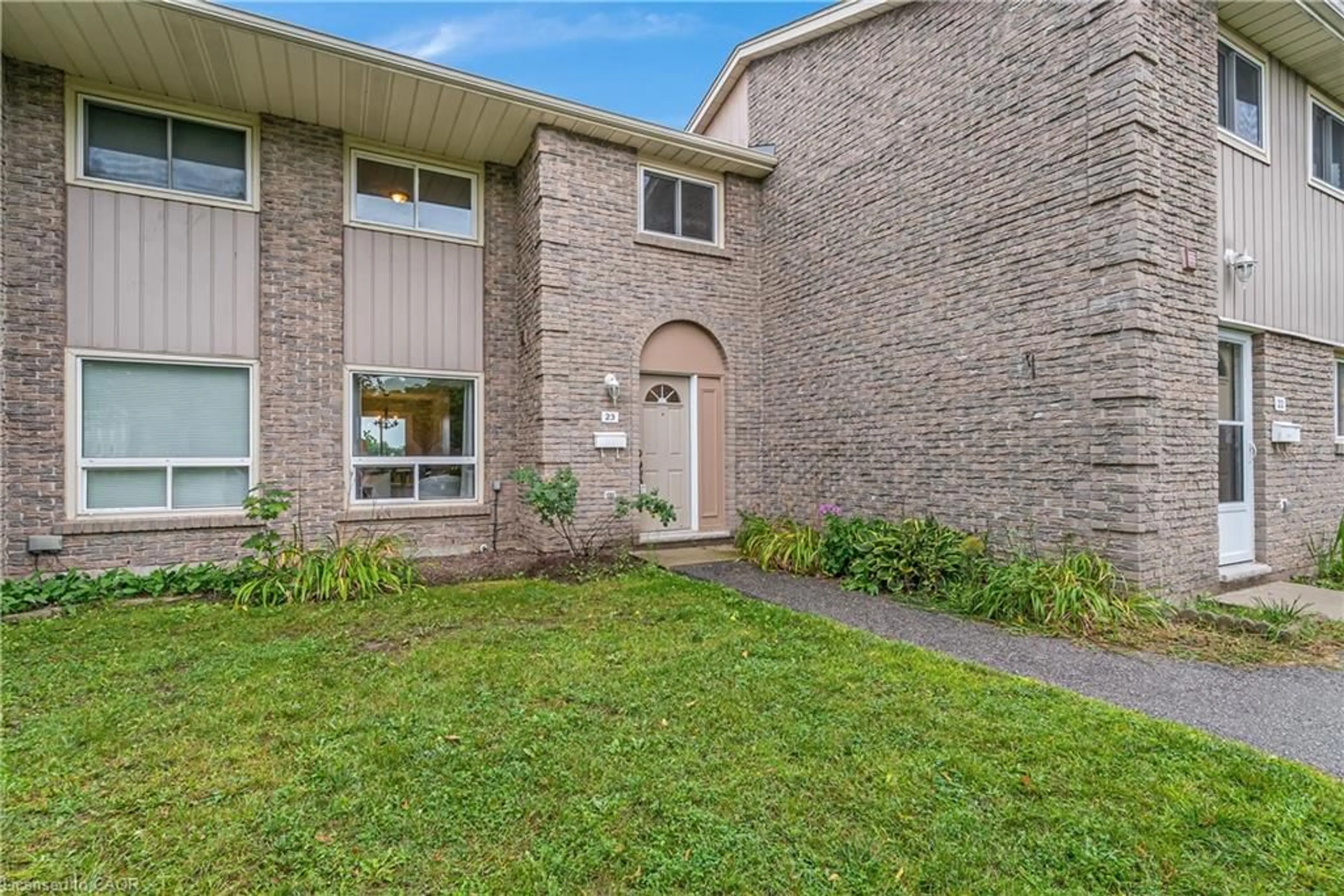 Home with brick exterior material, street for 25 Upper Canada Dr #23, Kitchener Ontario N2P 1G2