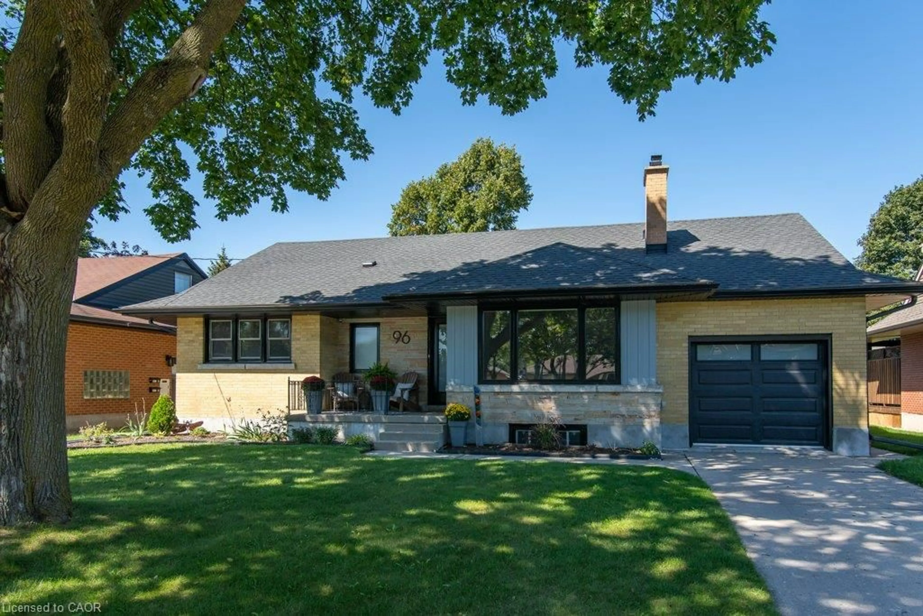 Home with brick exterior material, street for 96 Wedgewood Dr, Kitchener Ontario N2B 1E7