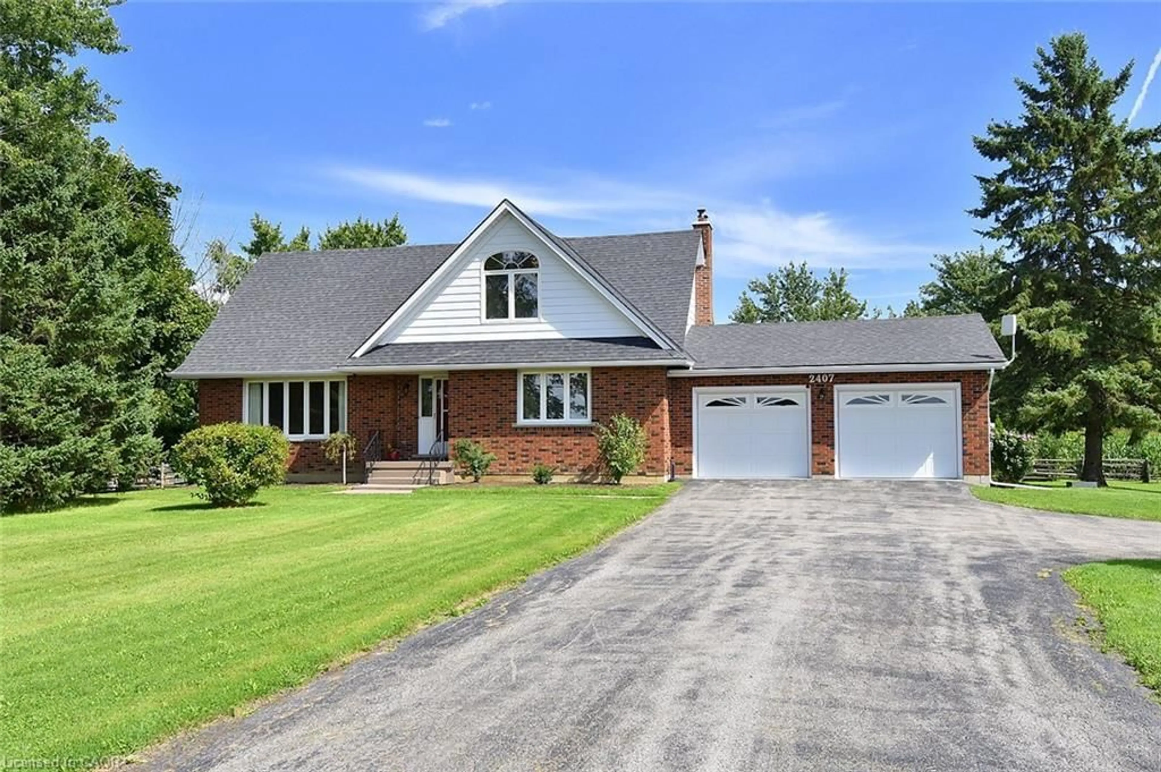 Home with brick exterior material, street for 2407 Caistor Centre Rd, Caistor Centre Ontario L0R 1E0