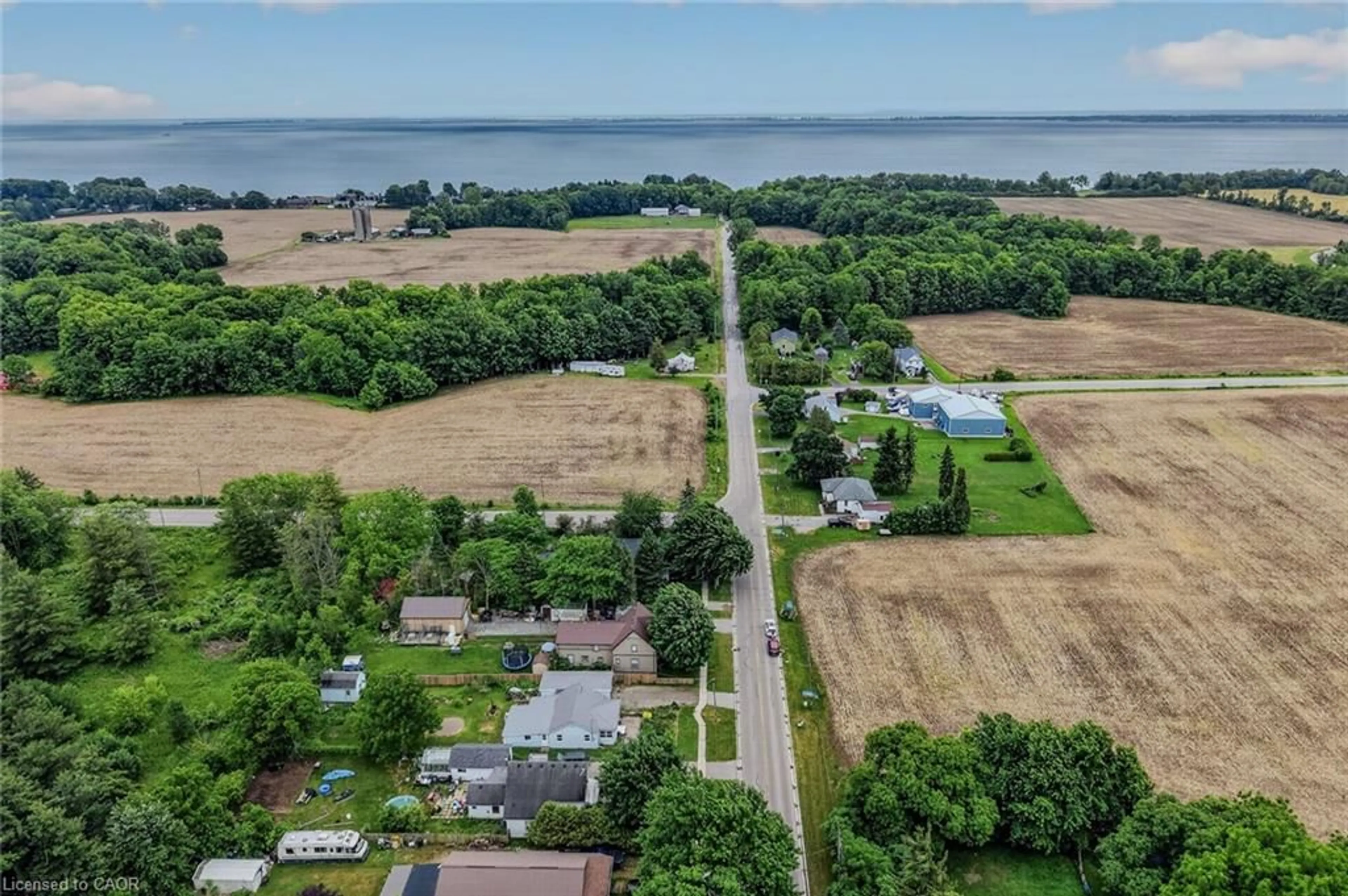 A pic from outside/outdoor area/front of a property/back of a property/a pic from drone, water/lake/river/ocean view for 140 Townline St, St. Williams Ontario N0E 1P0