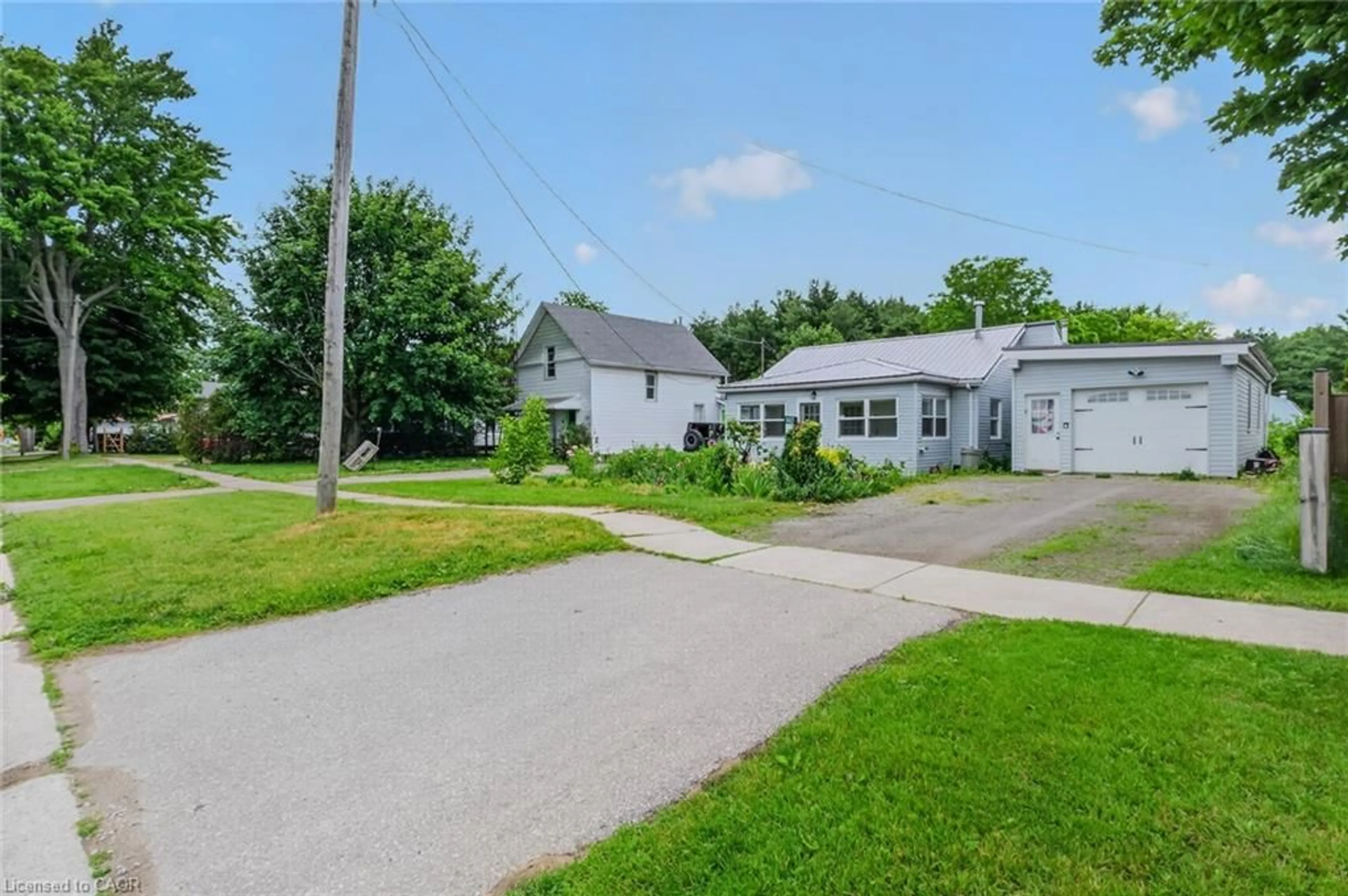A pic from outside/outdoor area/front of a property/back of a property/a pic from drone, street for 140 Townline St, St. Williams Ontario N0E 1P0