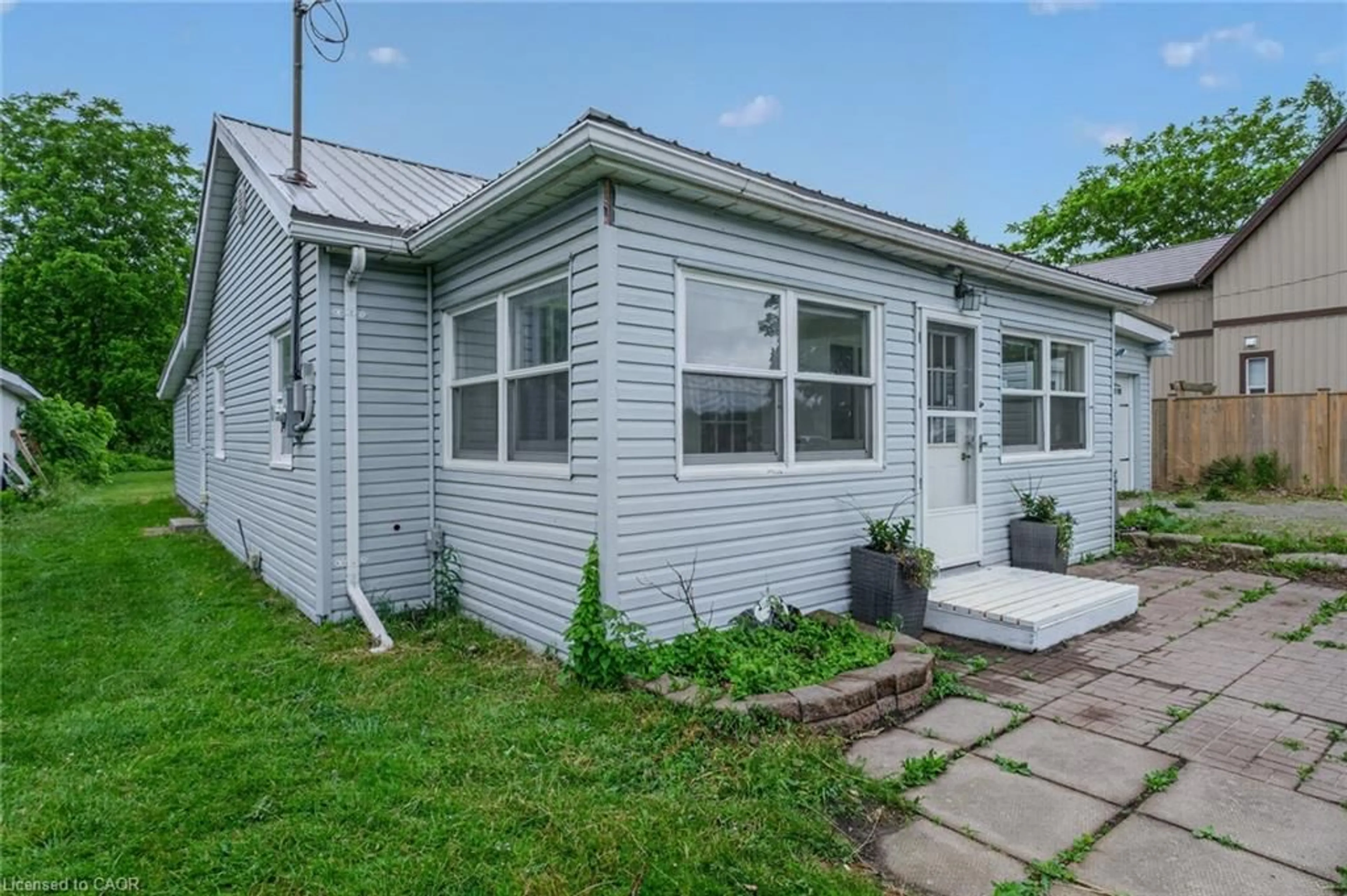 Home with vinyl exterior material, street for 140 Townline St, St. Williams Ontario N0E 1P0