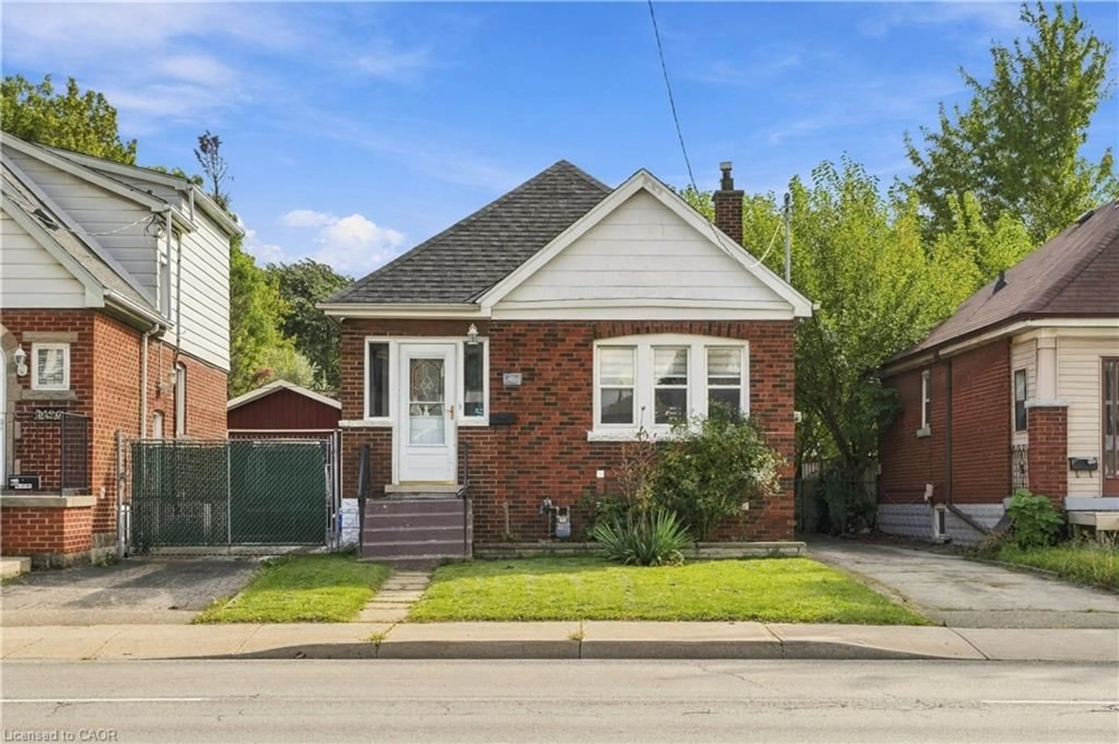 Home with brick exterior material, street for 1494 Main St, Hamilton Ontario L8K 1E1